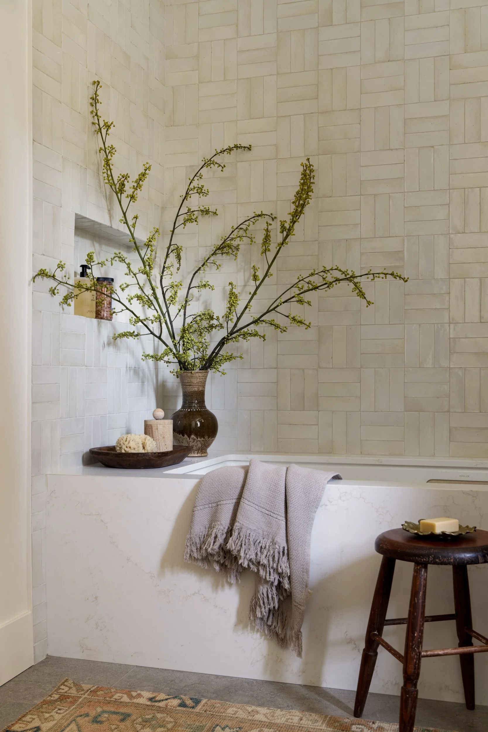 Soaking tub with handmade basketweave tile and a wooden stool, 286 Almenar Drive, Marin County