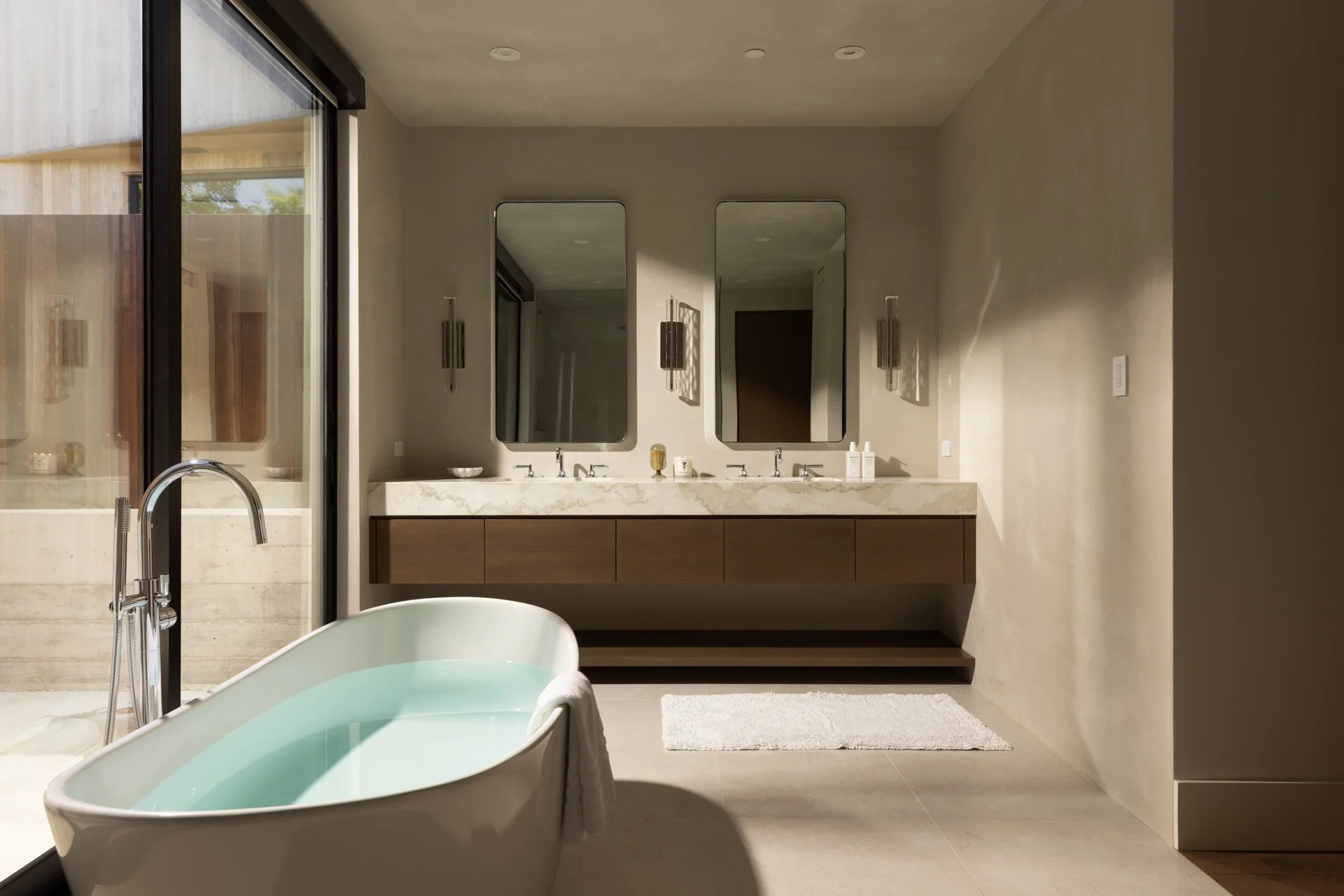 Primary bath with freestanding tub and double vanity, a resort residence at Montage Healdsburg