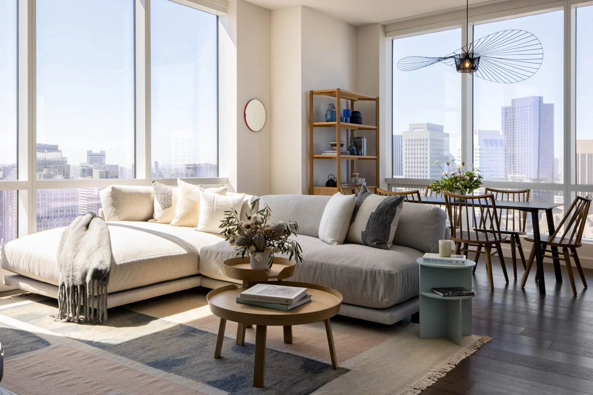 Model residence living and dining room by Clodagh Design, The Avery, San Francisco