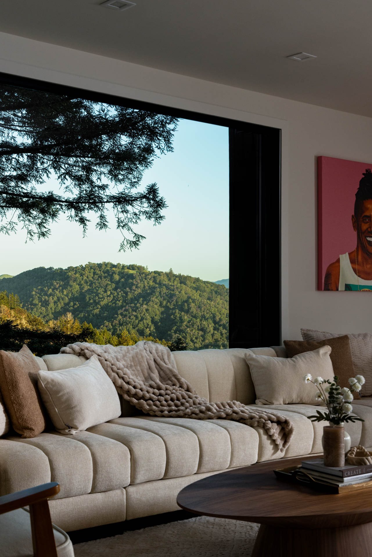 Living room sofa beside a corner window onto Mount Tamalpais ridges, 238 Summit Drive, Corte Madera