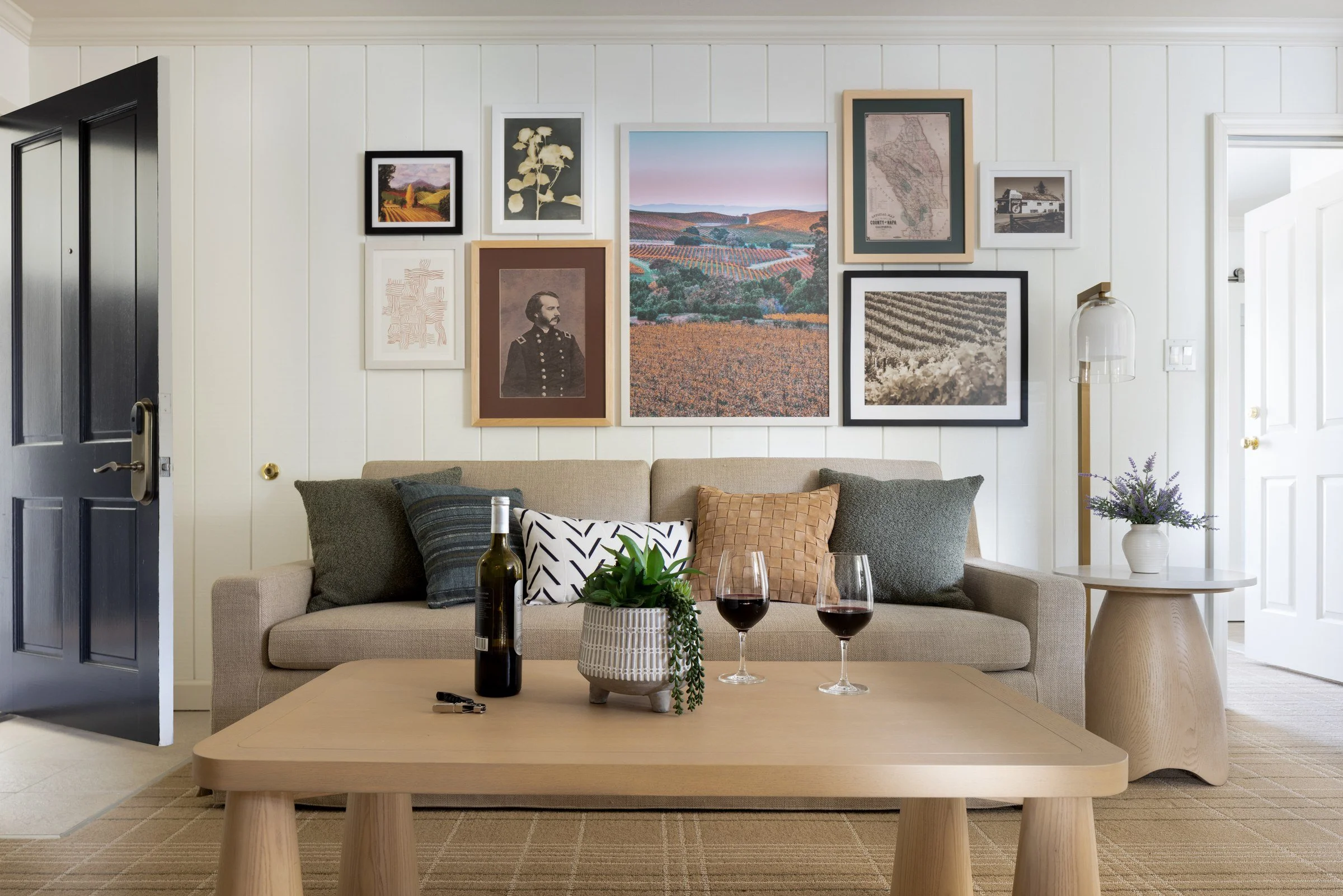 Cottage suite living room with a gallery wall of Napa landscapes, Silverado Resort
