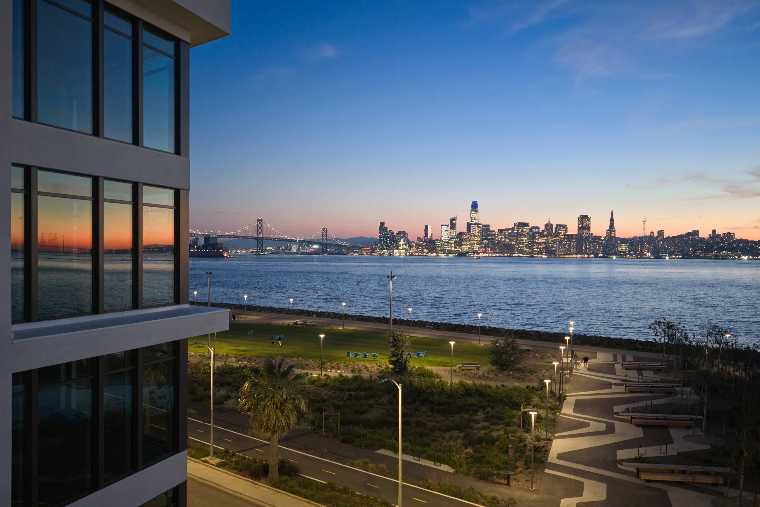 Dusk view over Cityside Park to the Bay Bridge and San Francisco skyline, 490 Avenue of the Palms, Treasure Island