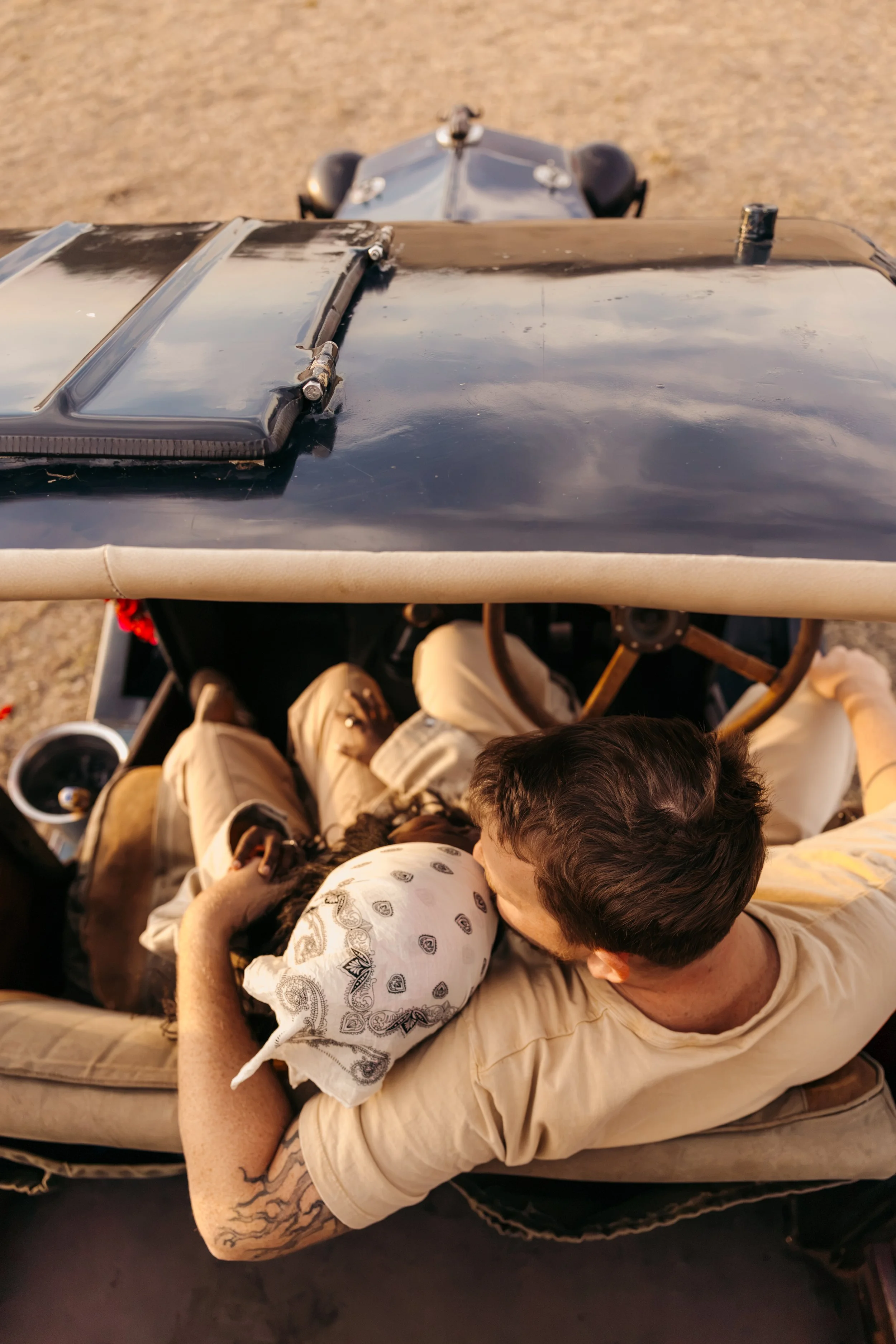 romantic couple safari Maasai Mara iconic vintage car Cottar's camp luxury property lodge proposal
