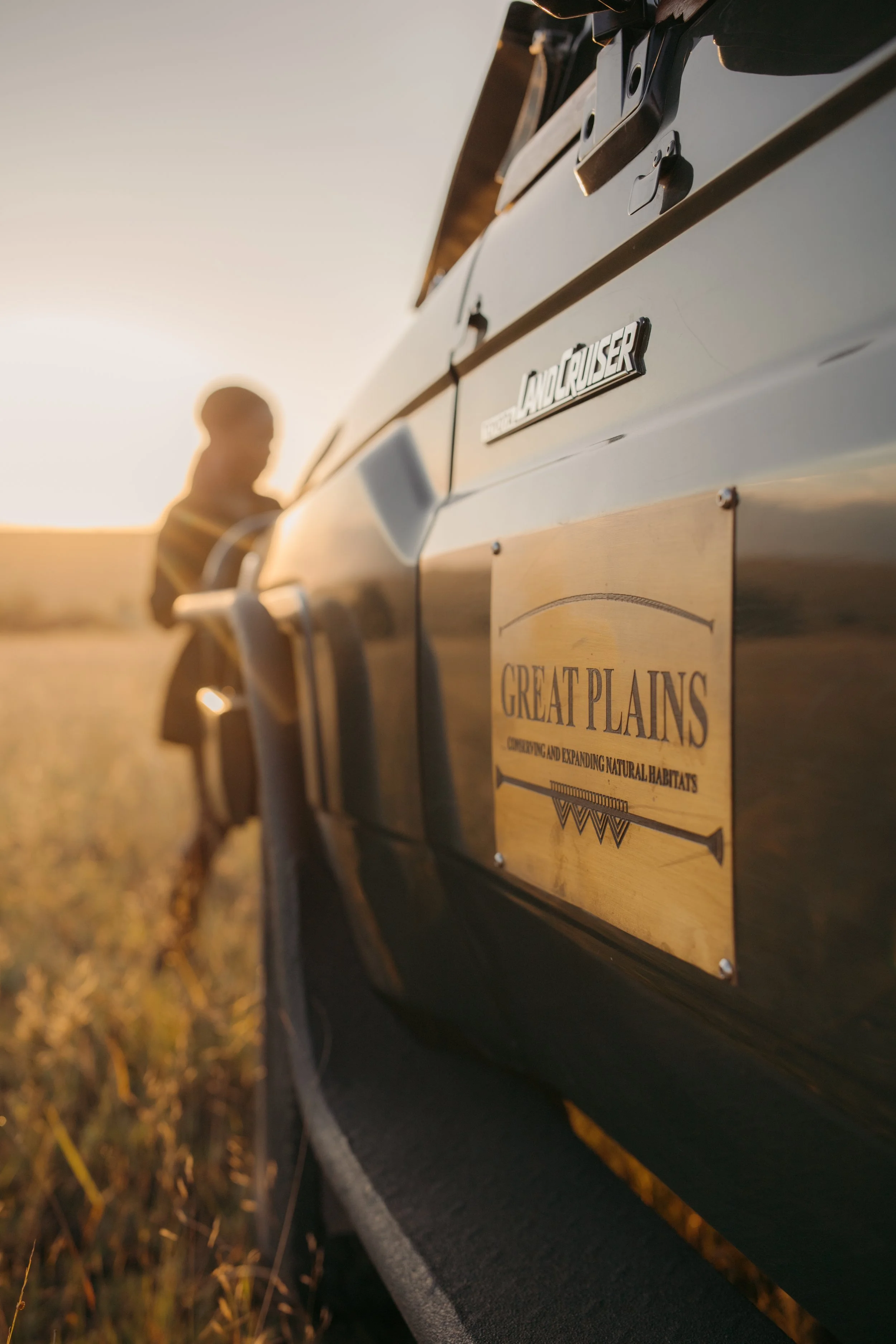 Great Plains Ol Donyo sunset safari vehicle game drive sundowners candid