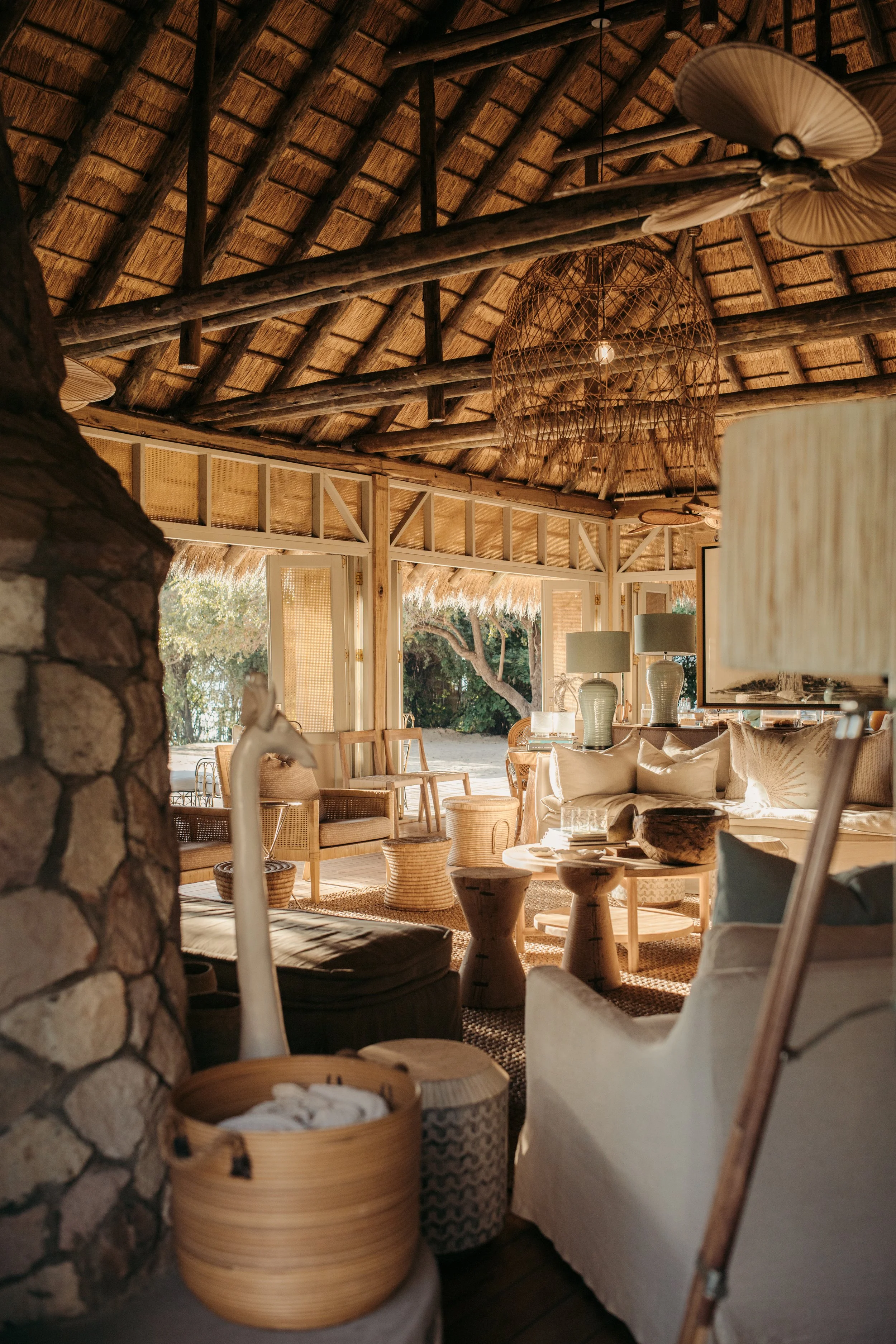 Mpala Jena Zimbabwe Victoria Falls luxury safari property lodge common area dining aesthetic beautiful beach and bush