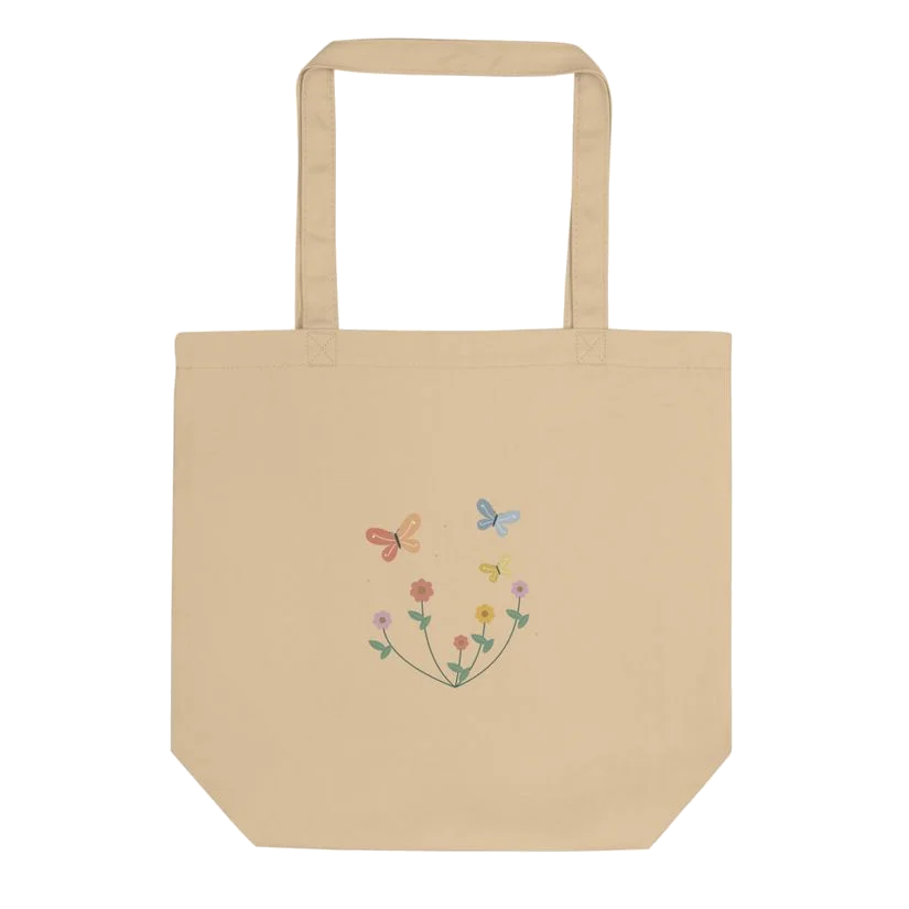 Meadow Flutter cotton tote in Oyster with original butterfly and meadow illustration