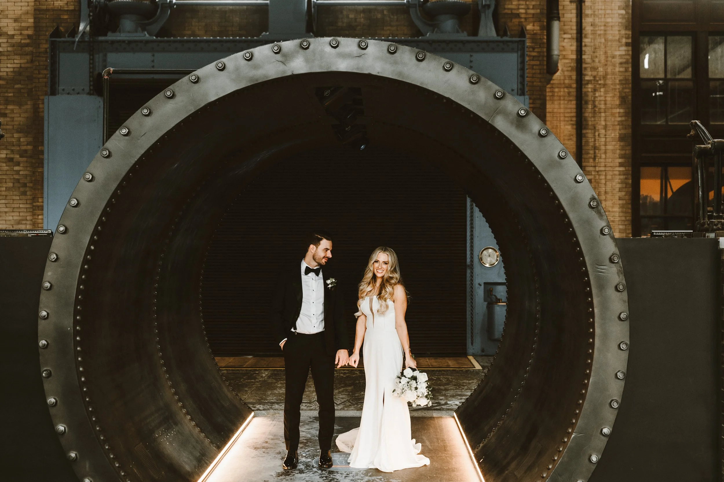 newlyweds in tunnel at power plant