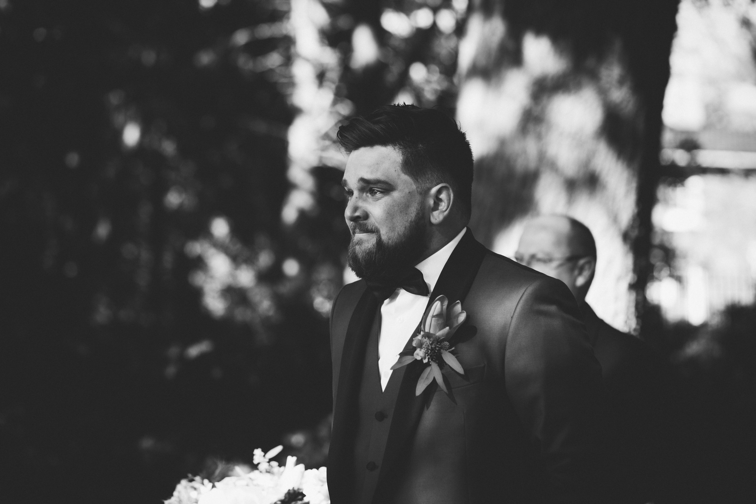 groom losing it as his bride approaches
