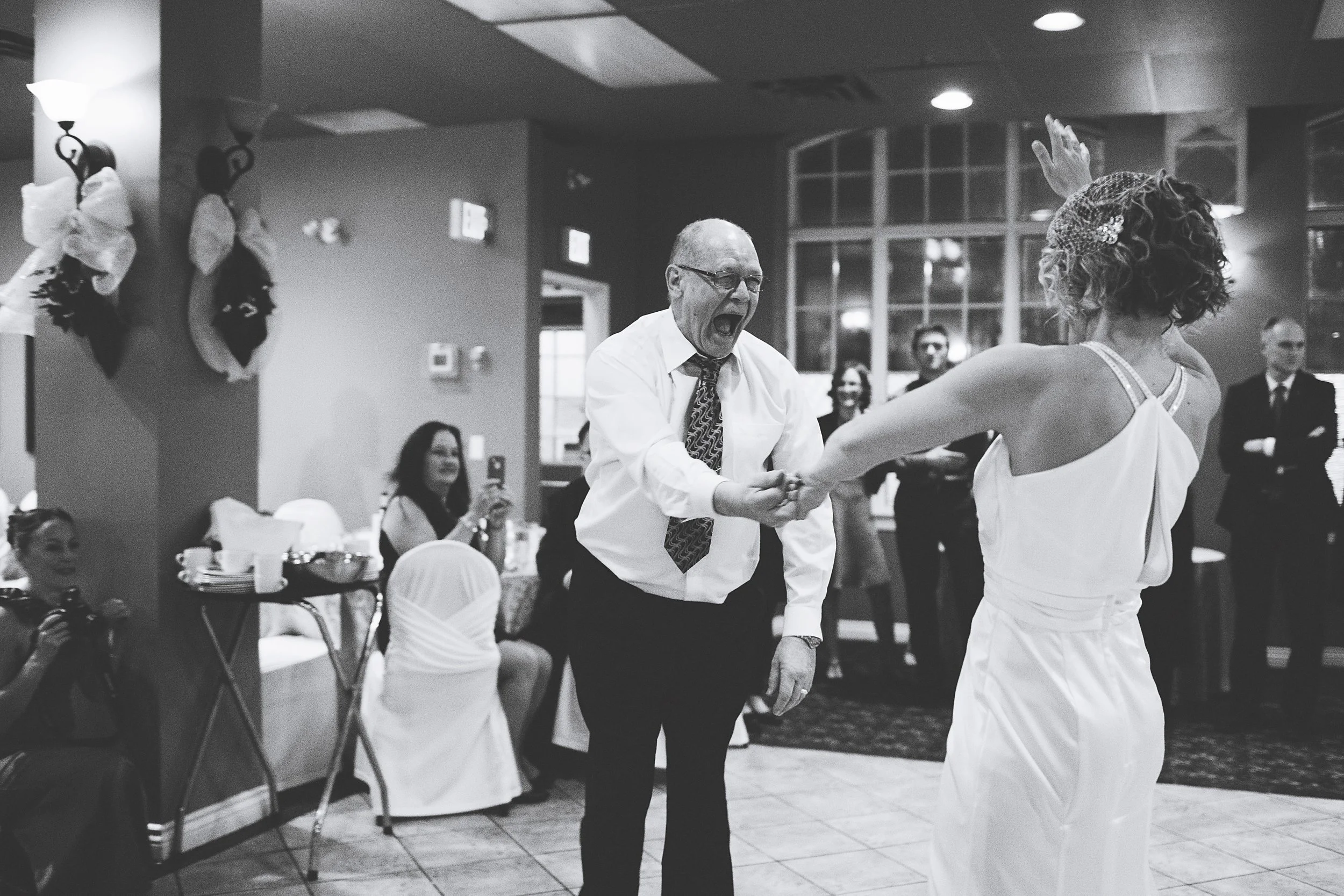 father of the bride overjoyed on the dance floor