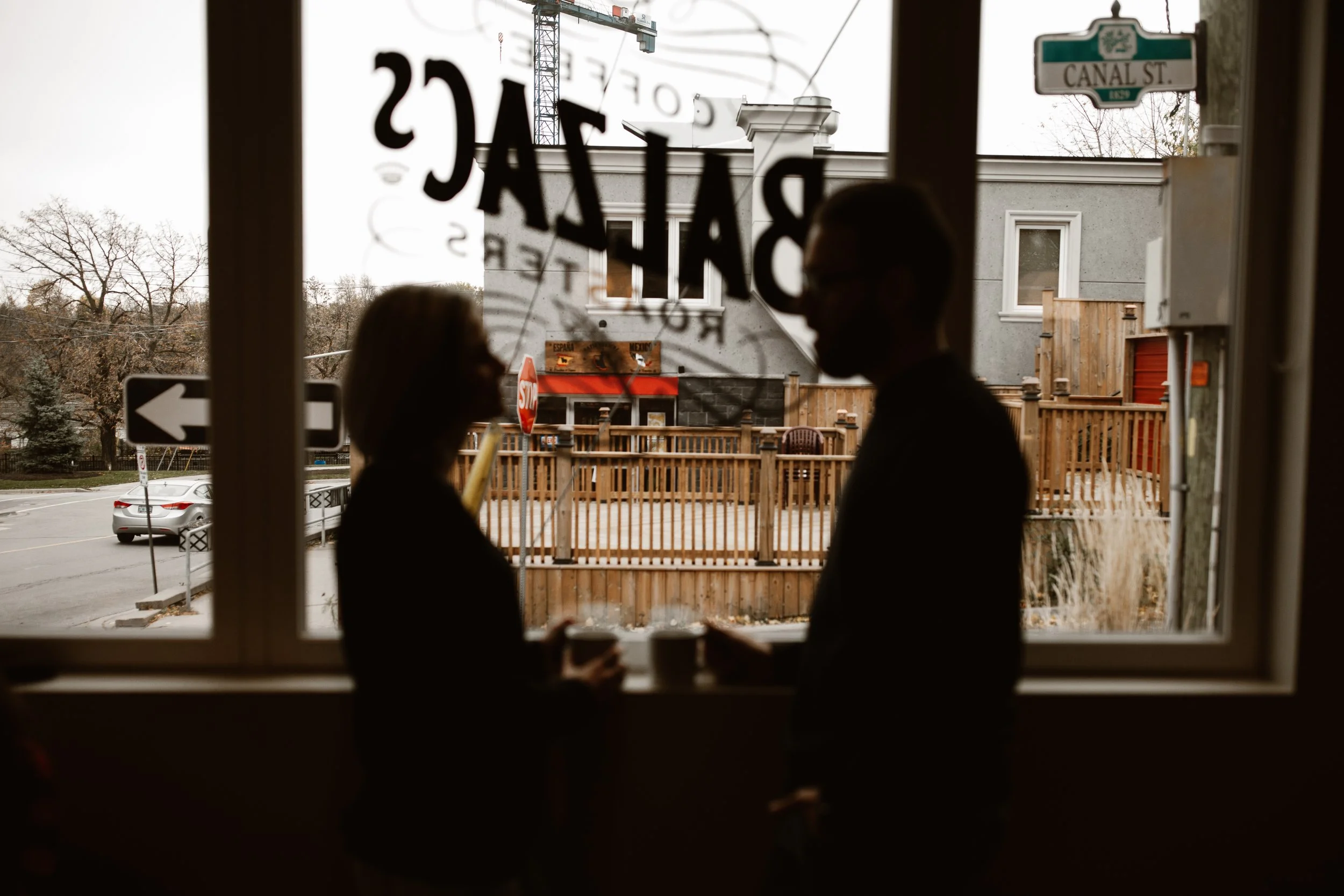 couple sharing a coffee by window at Balzac's Port Dalhousie
