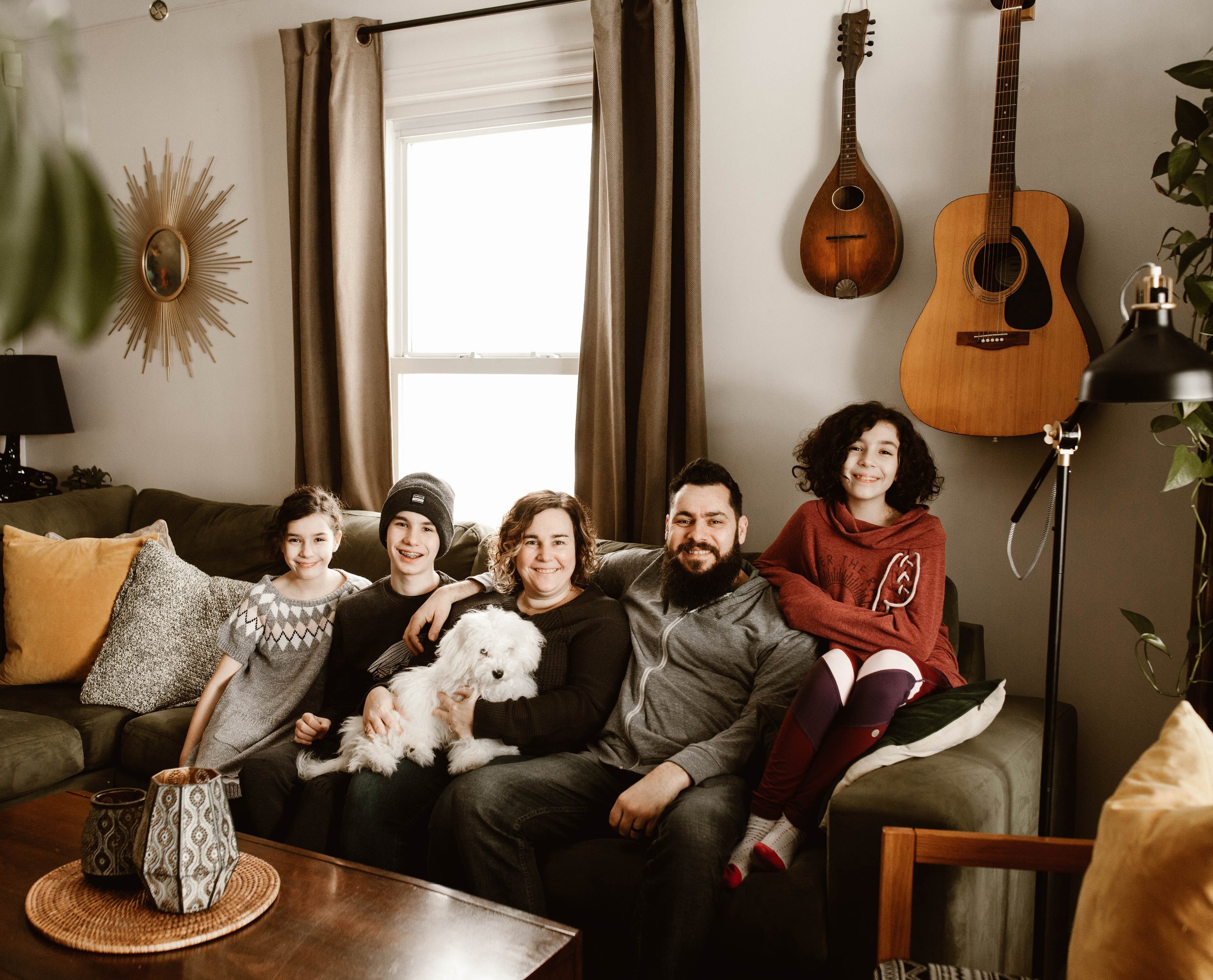 niagara photographers reclining on the couch with the family