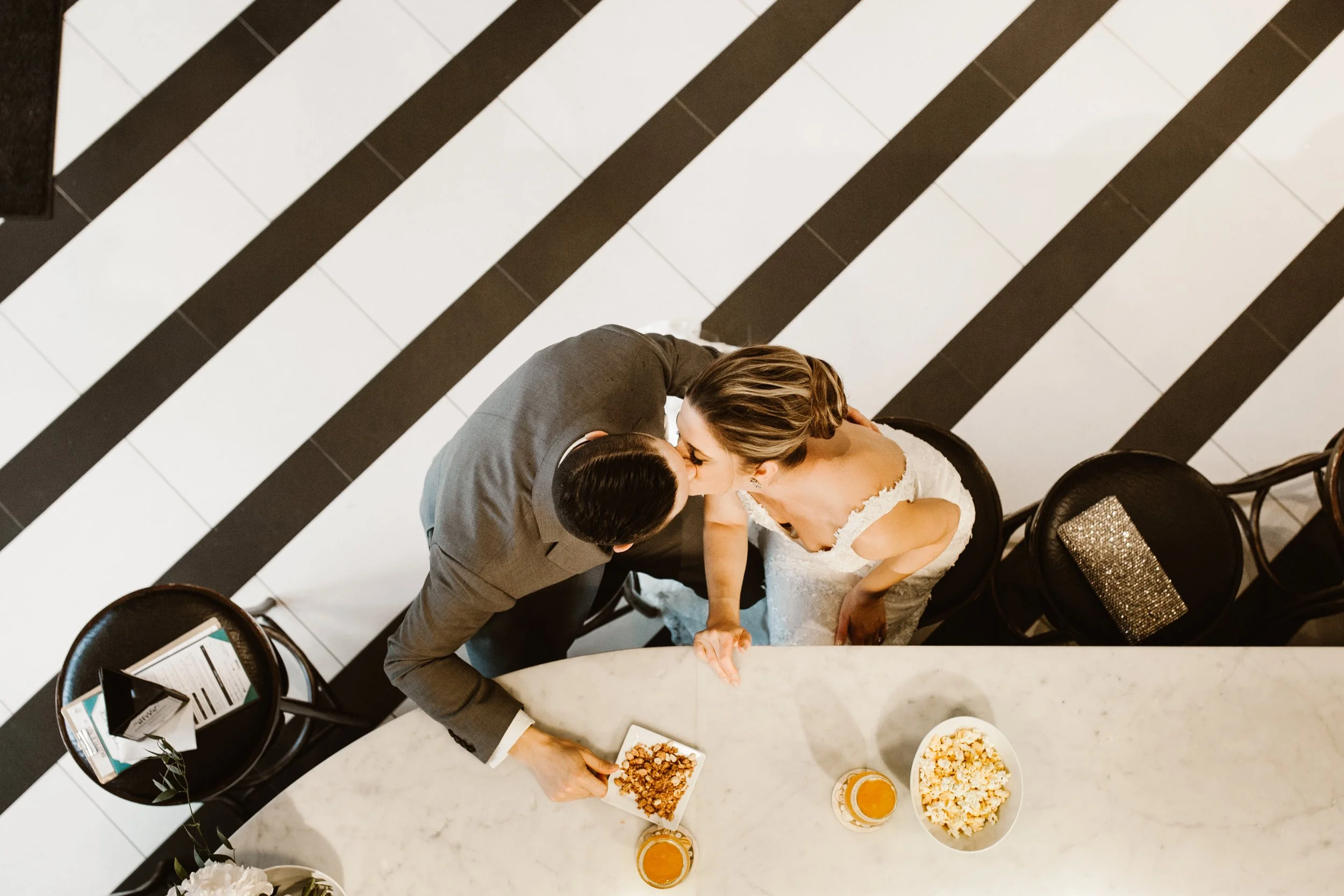 birds of view of bride and groom kissing at exchange brewery niagara on the lake