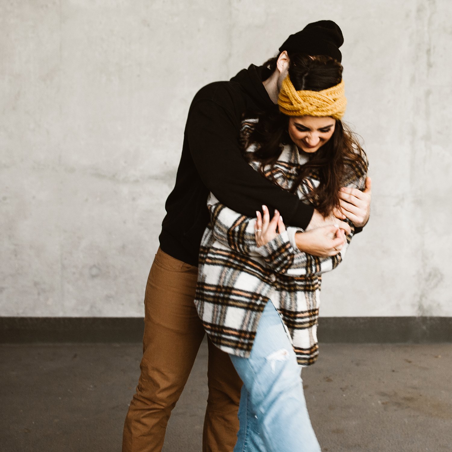 downtown st. catharines couple laughing and hugging