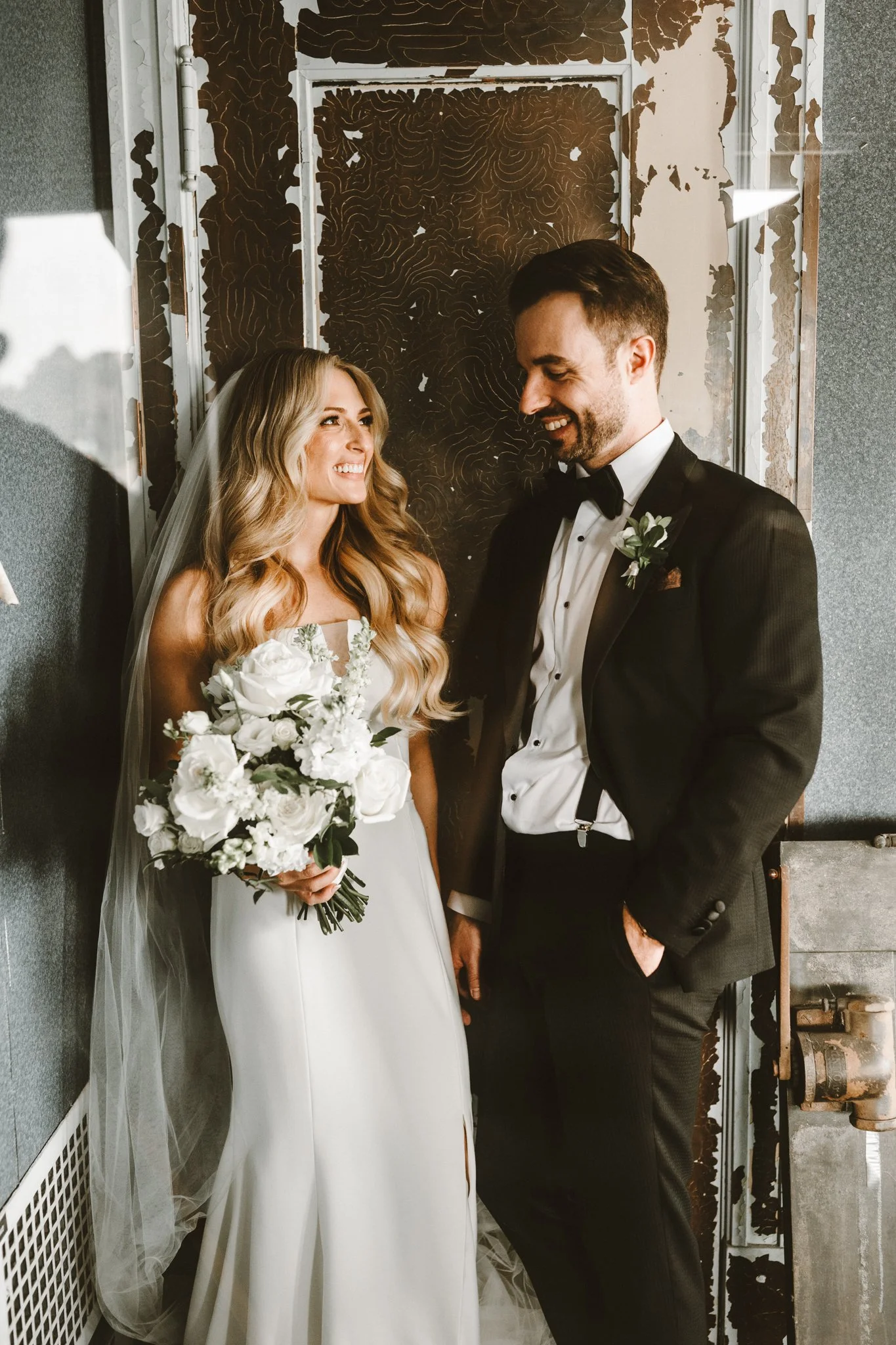 happy newly weds share a smile post ceremony