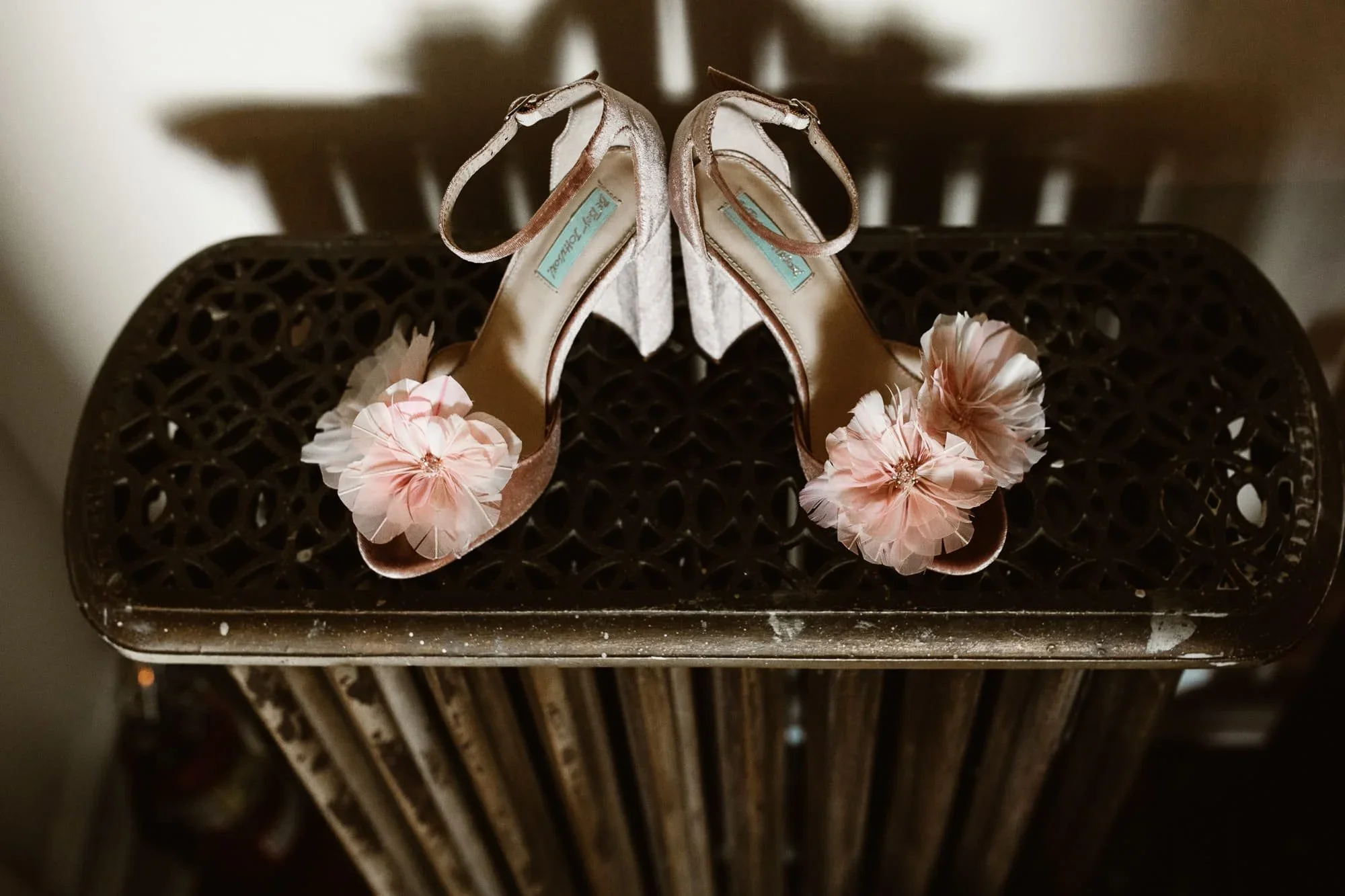 bride shoes on old radiator 