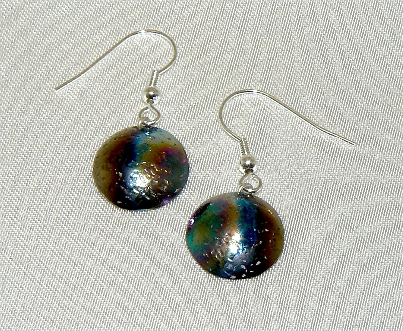 Tiny torch coloured titanium earrings