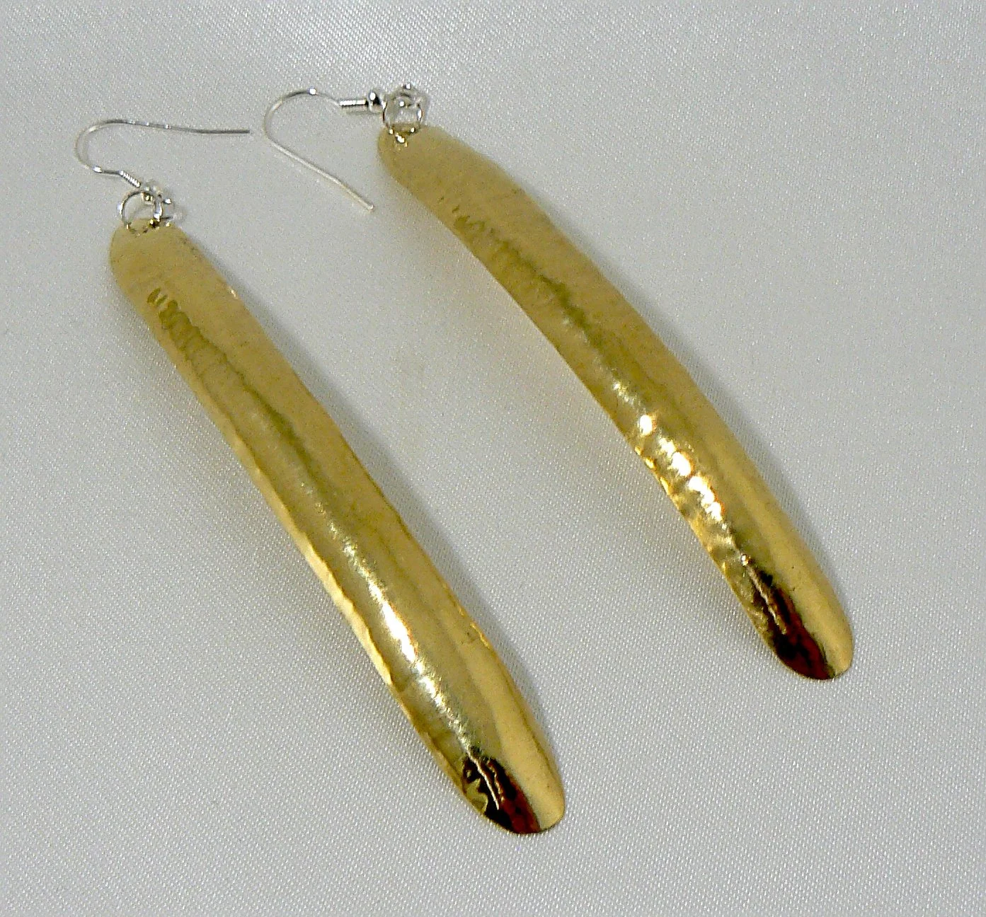 Hammered, curved brass ear rings, 100mm