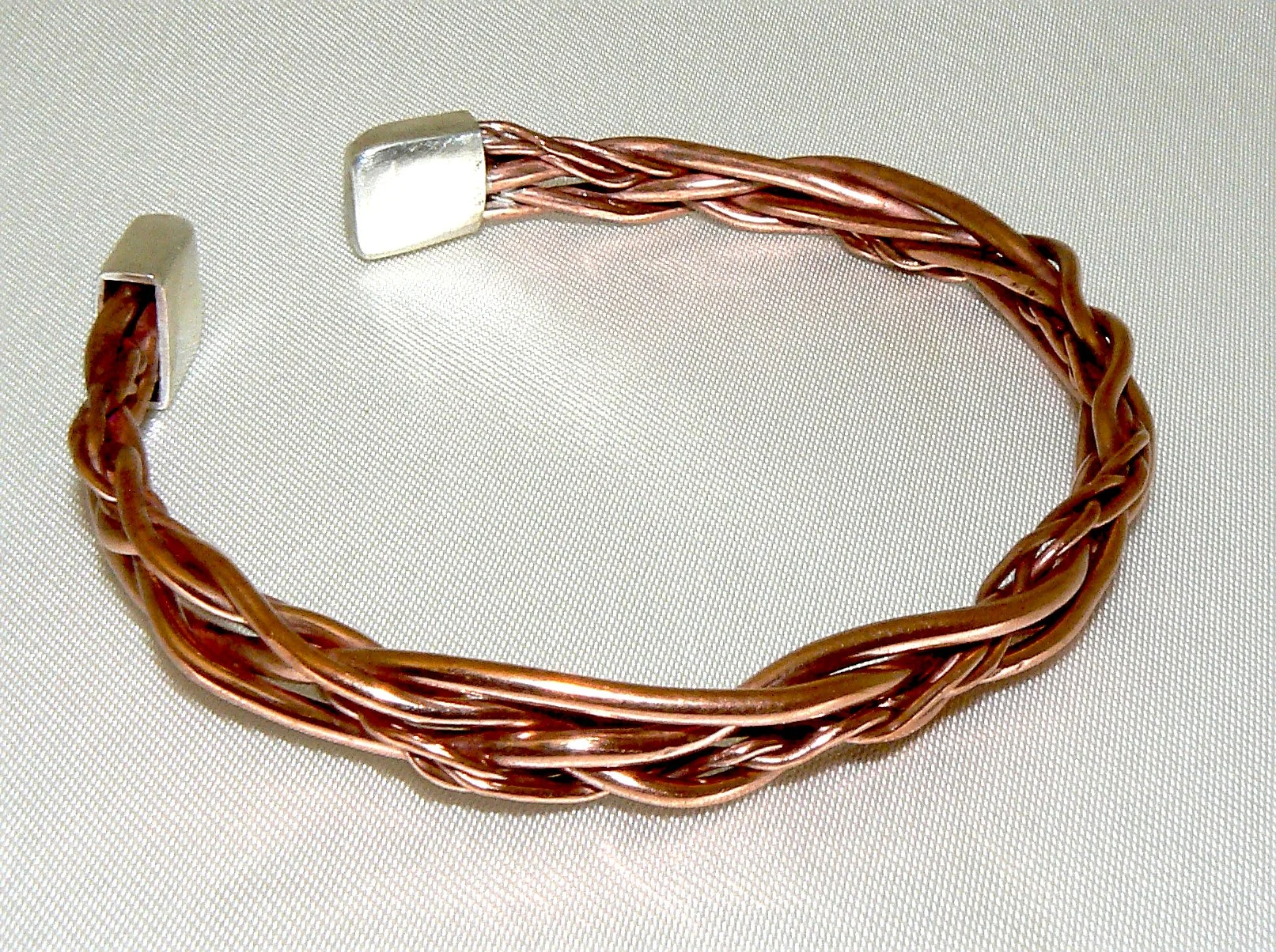 5 way plait copper cuff with silver box ends, 80mm diameter