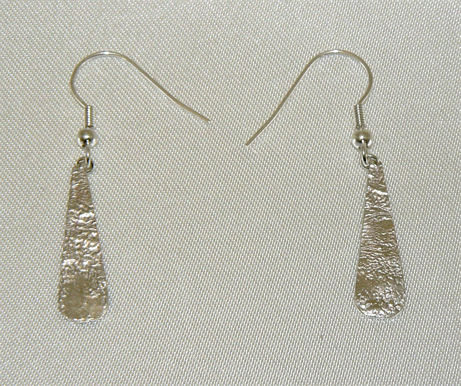 Tiny hammered sterling silver earrings