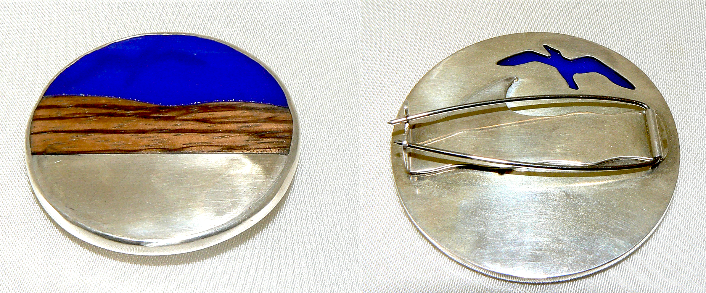 Water, hill, and sky broach. Silver, glass, and wood, 50mm -SOLD