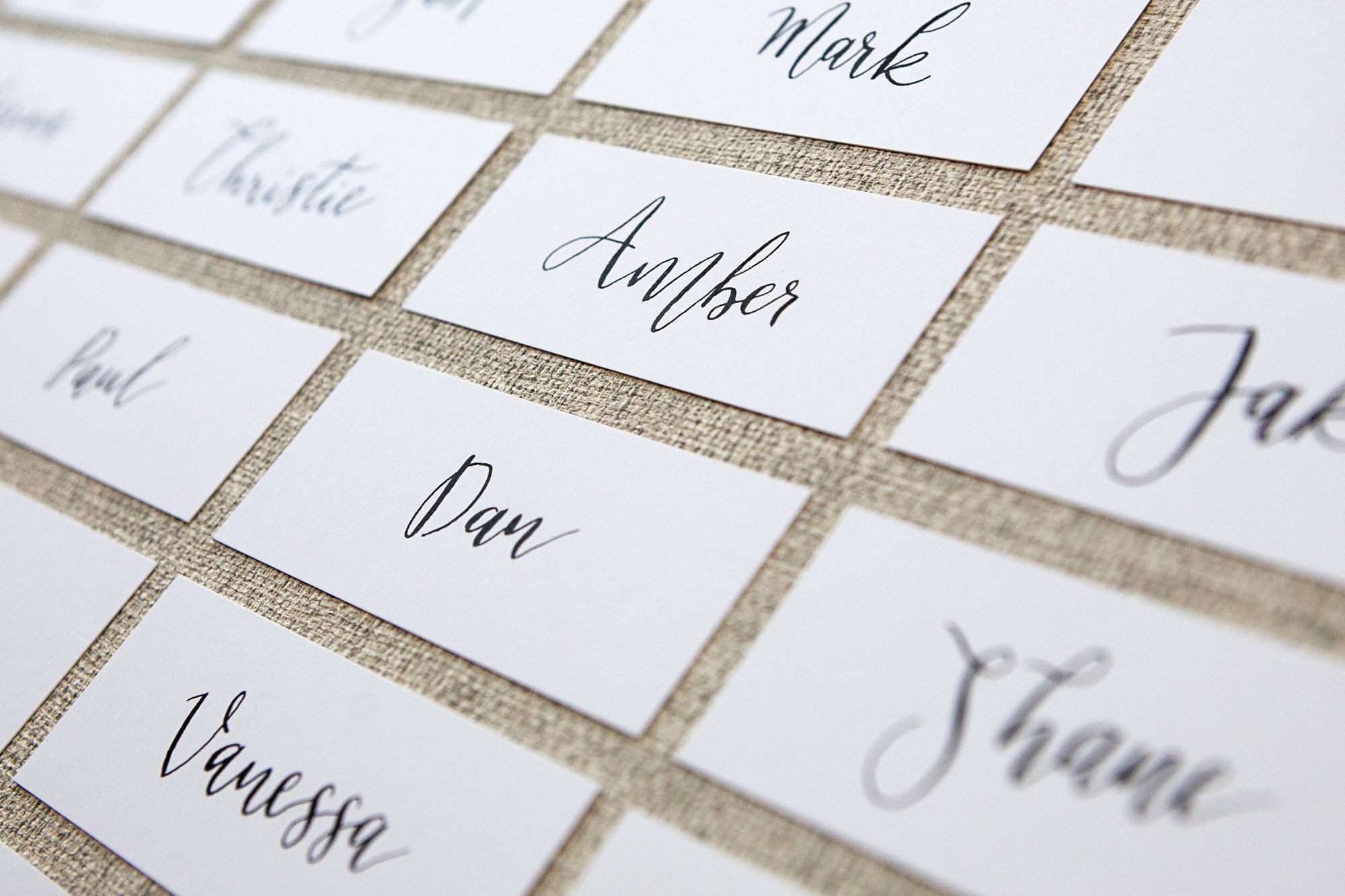 Black-calligraphy-straight-edge-place-cards-on-white.jpg
