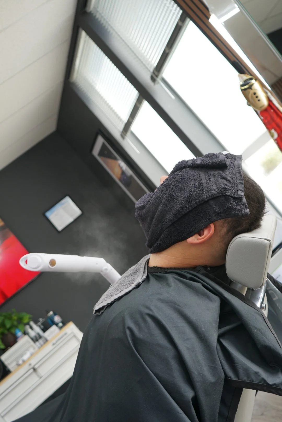 Patient wearing protective eye covering during a dental treatment in a modern clinic