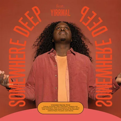 Album cover featuring a curly-haired Black man in a red jacket and yellow shirt, looking upward against a rust-red background with curved orange text reading “SOMEWHERE DEEP” and “SOMEWHERE.”