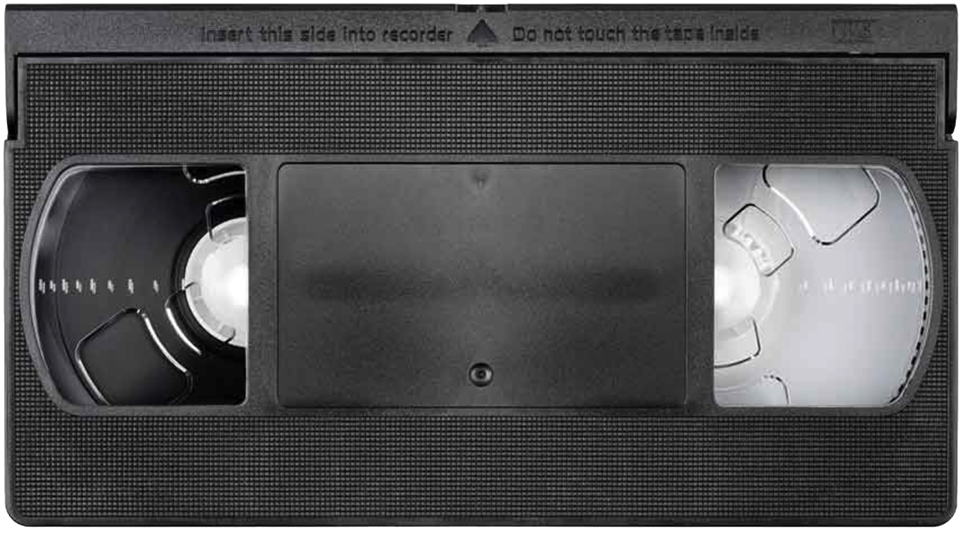 A blank VHS tape with black shell, spools of magnetic tape on either side, and empty space in the middle.