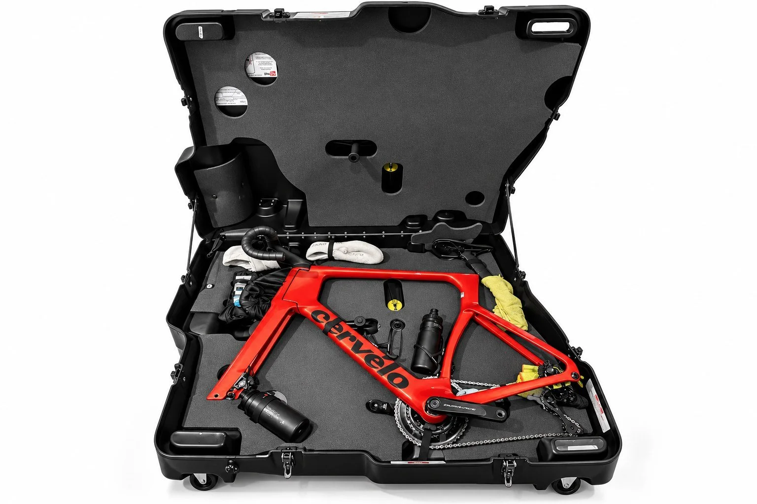 Open Bike Box Alan with a red Cervelo frame, wheels removed, packed with bottles and soft kit