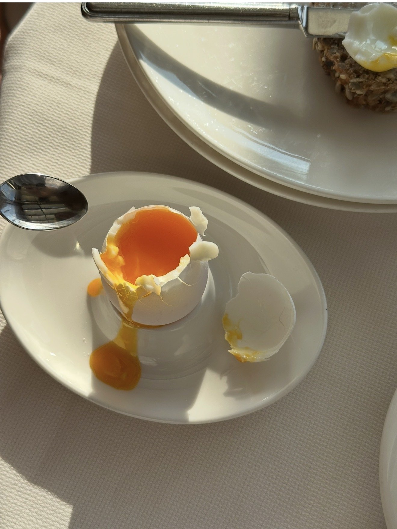 Soft-boiled egg and seeded bread at breakfast at My Arbor