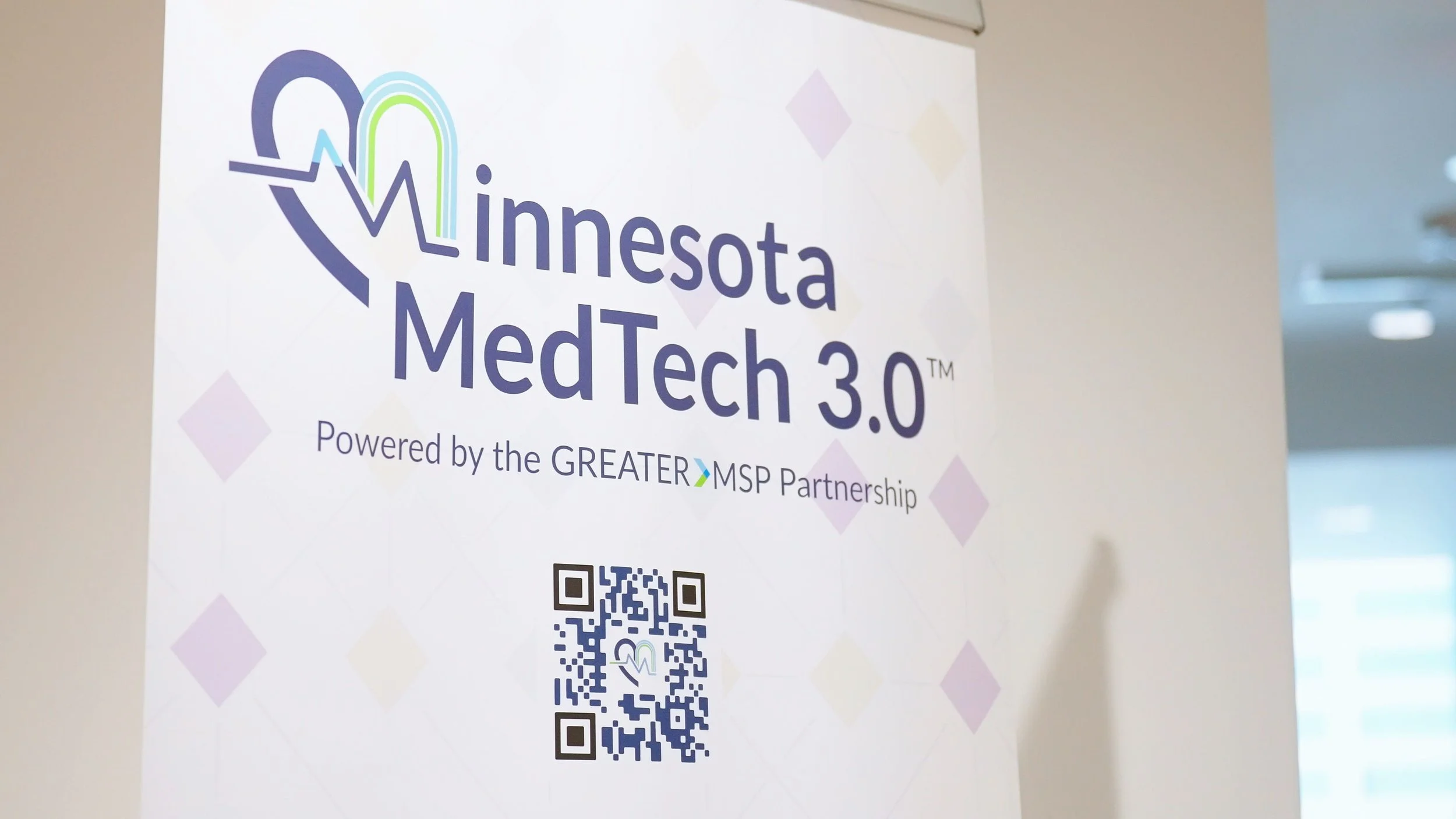 Minnesota MedTech 3.0 sign powered by the Greater MSP Partnership with a QR code