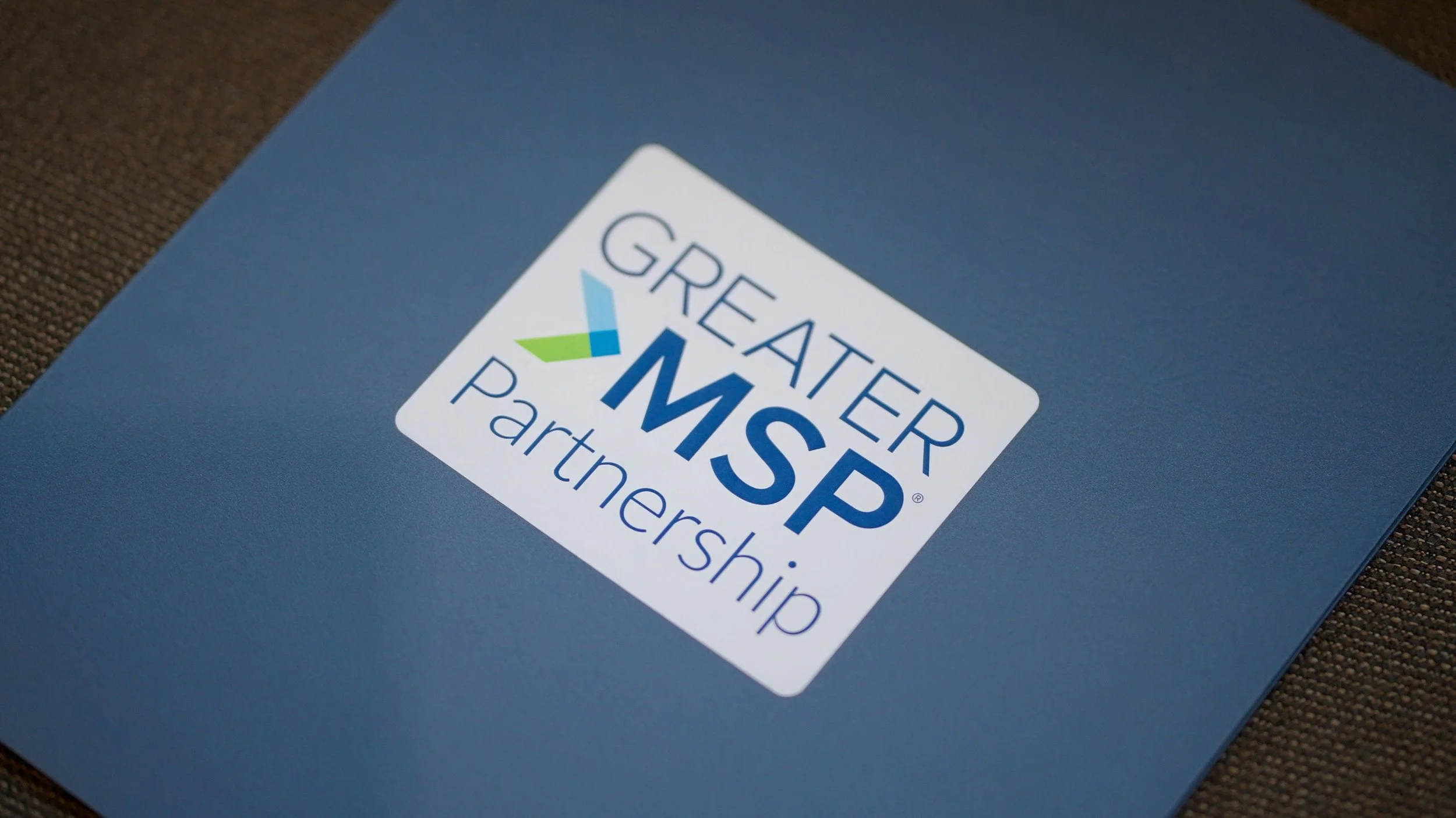 Great Lakes Veterinary Partners logo on a blue folder