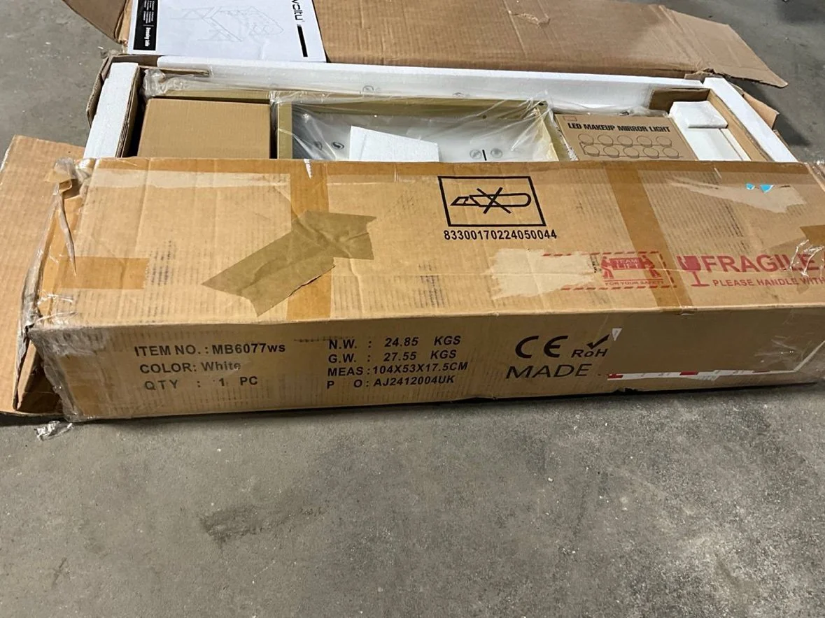 Open box for the white Woltu dressing table vanity, as received in the warehouse