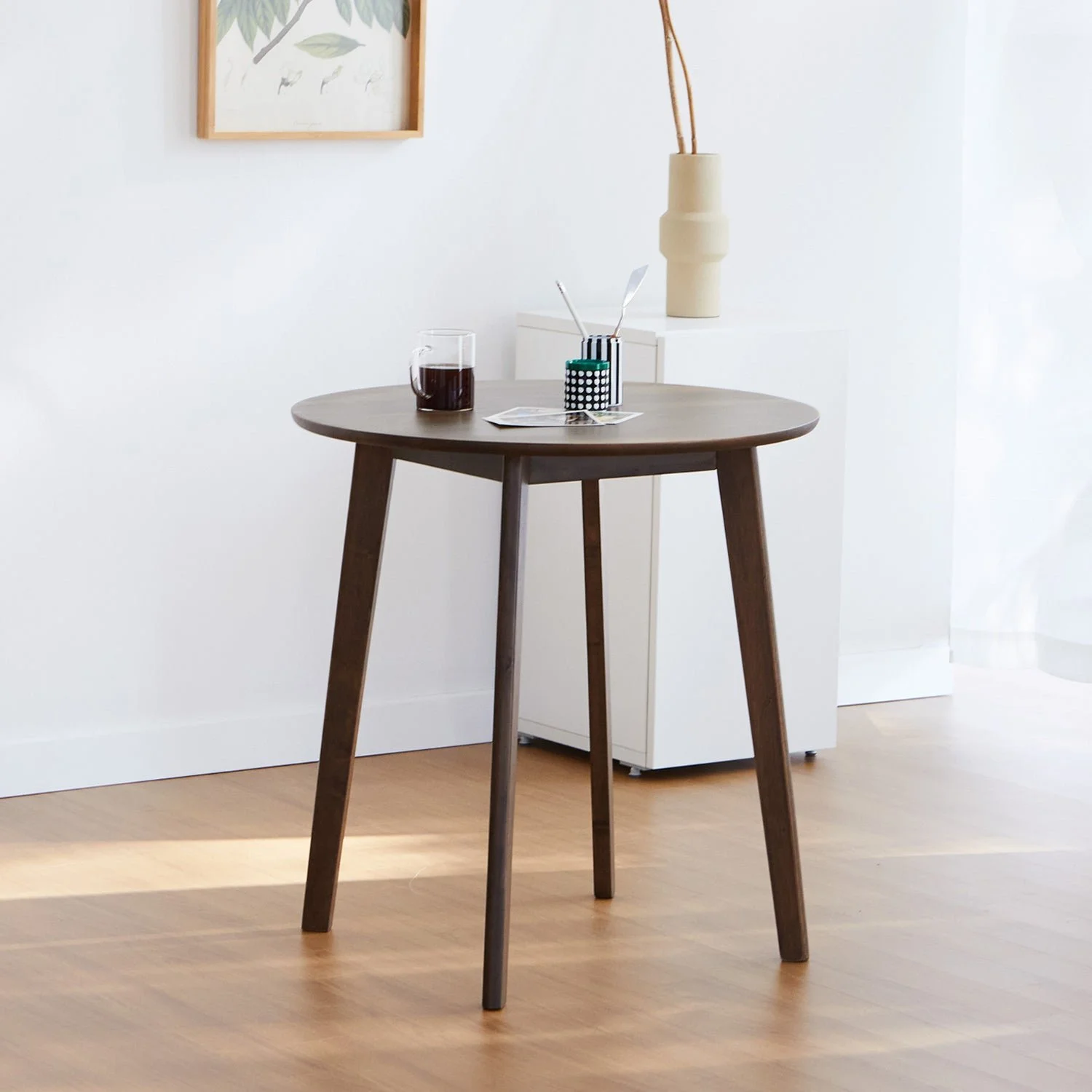 Livinia Canberra round dining table in walnut finish