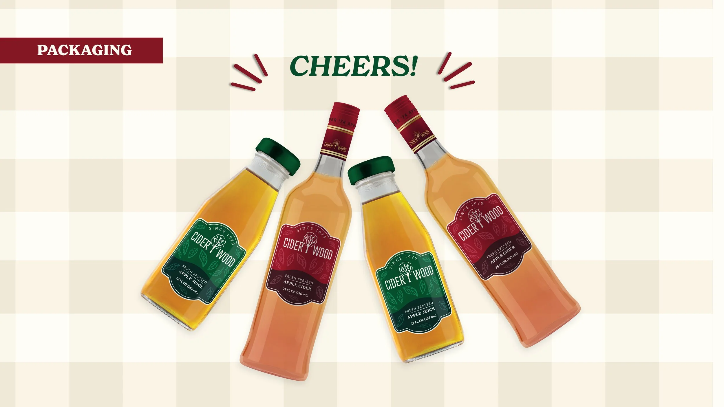 Four Cider Wood apple cider bottles on a checkered background with “Cheers!” and “Packaging” text