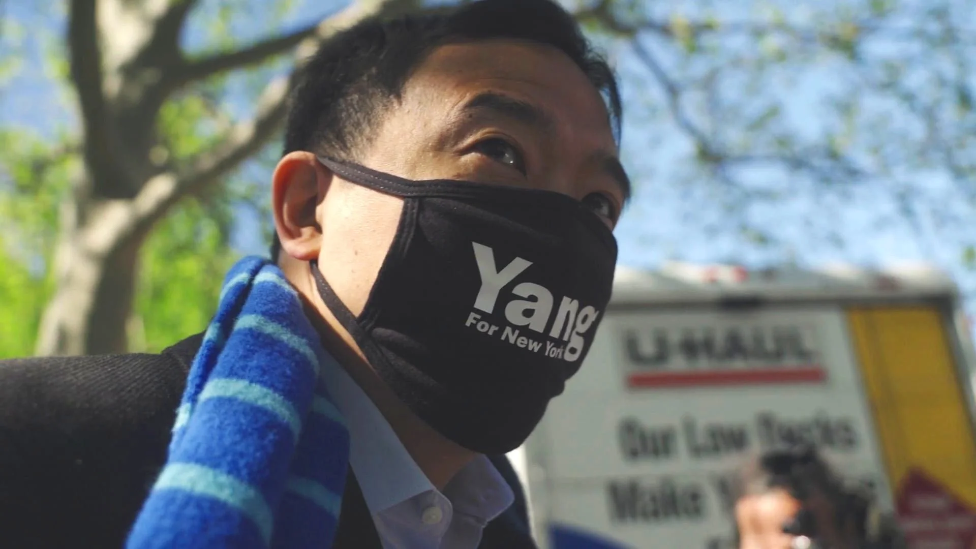 A supporter in a Yang for New York face mask, still from a campaign film for Andrew Yang