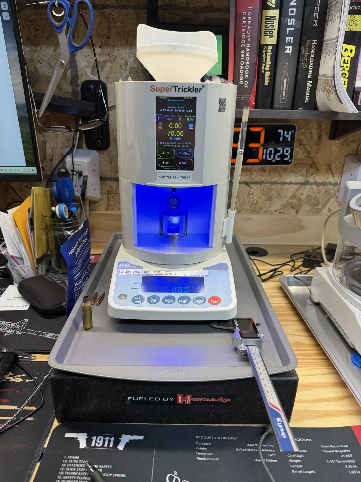 SuperTrickler powder measure on an A&D FX-300i balance