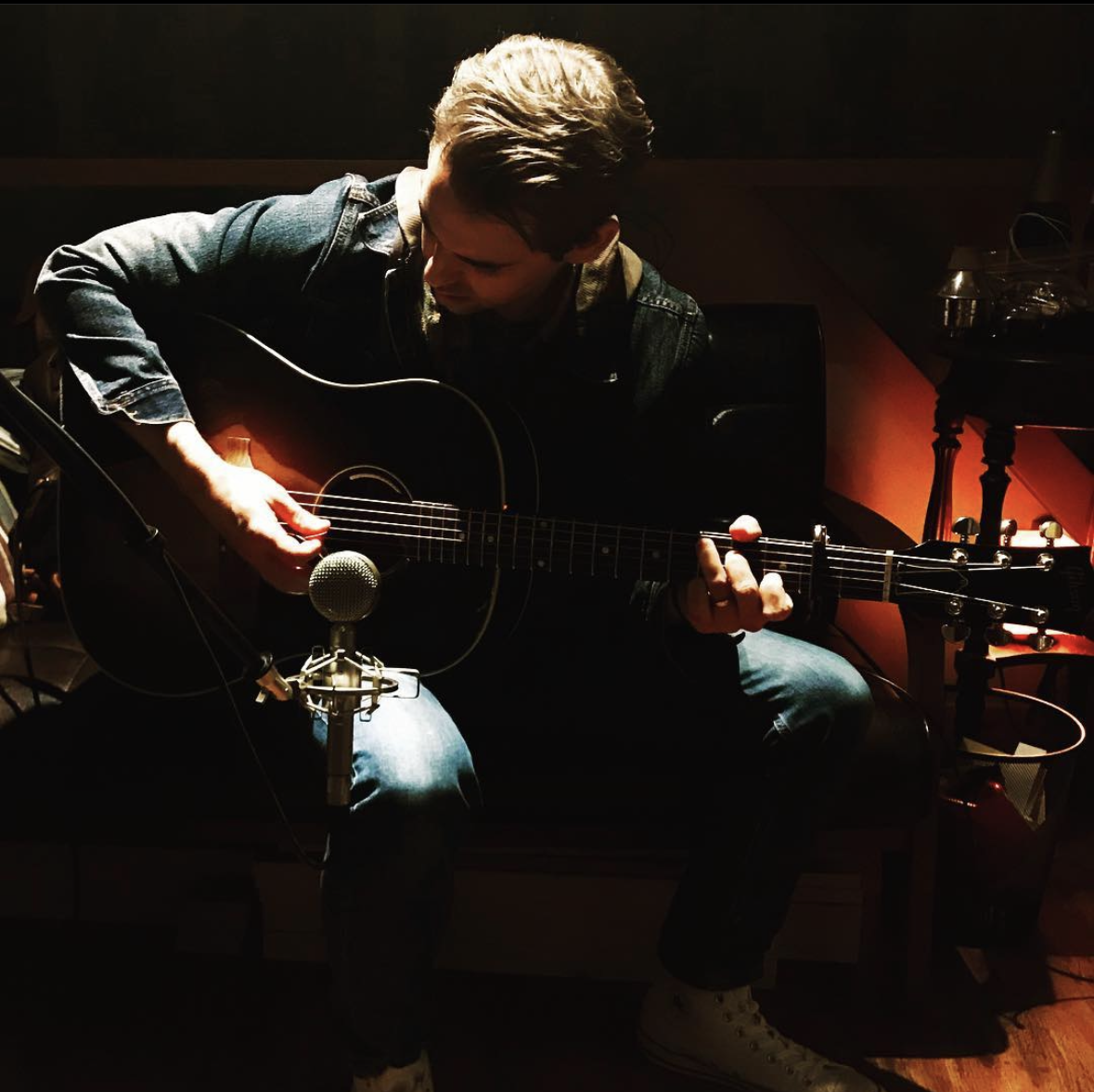 Keeton Coffman playing a Gibson 45 into studio microphone. 