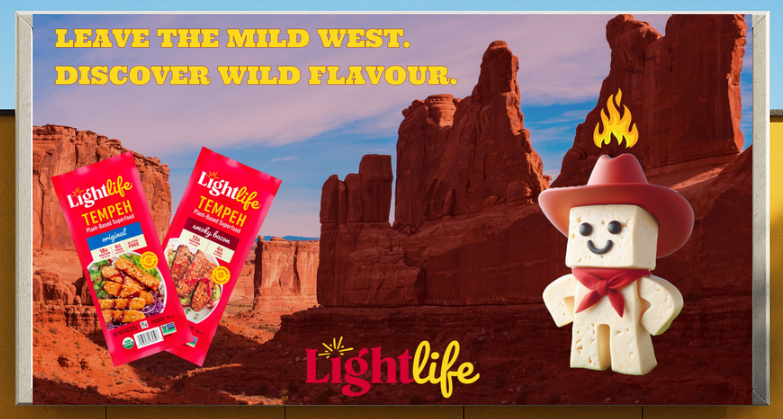 Lightlife Tempeh advertisement featuring product packages, a smiling tempeh cowboy mascot, and red rock desert scenery