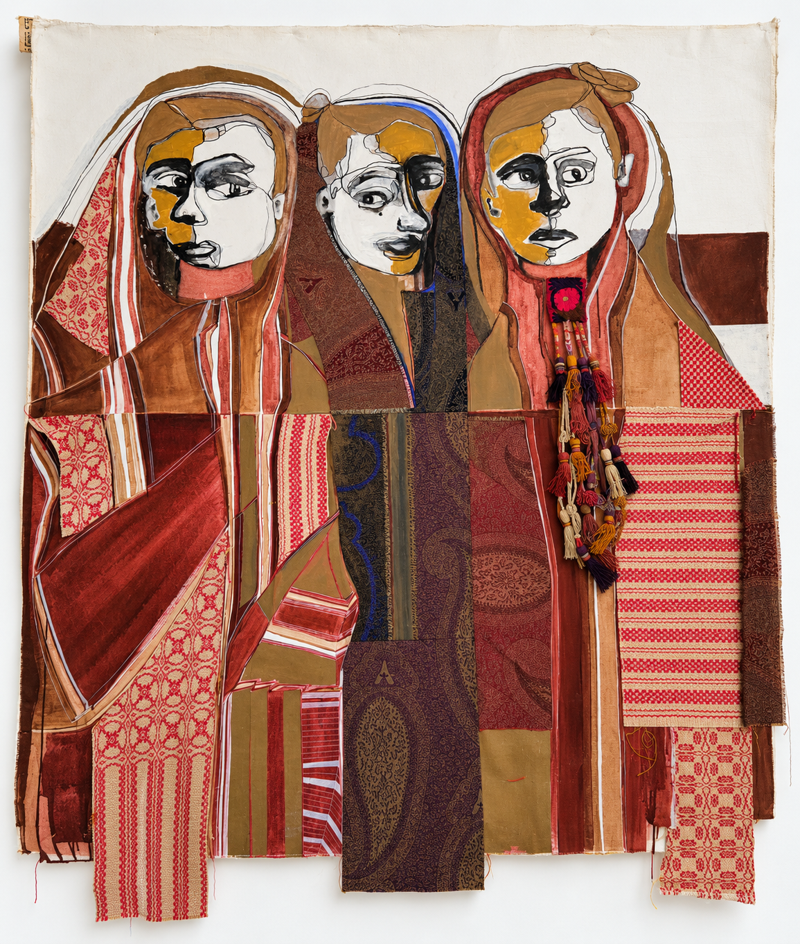 Three Faces in Earthy Textile Collage.png