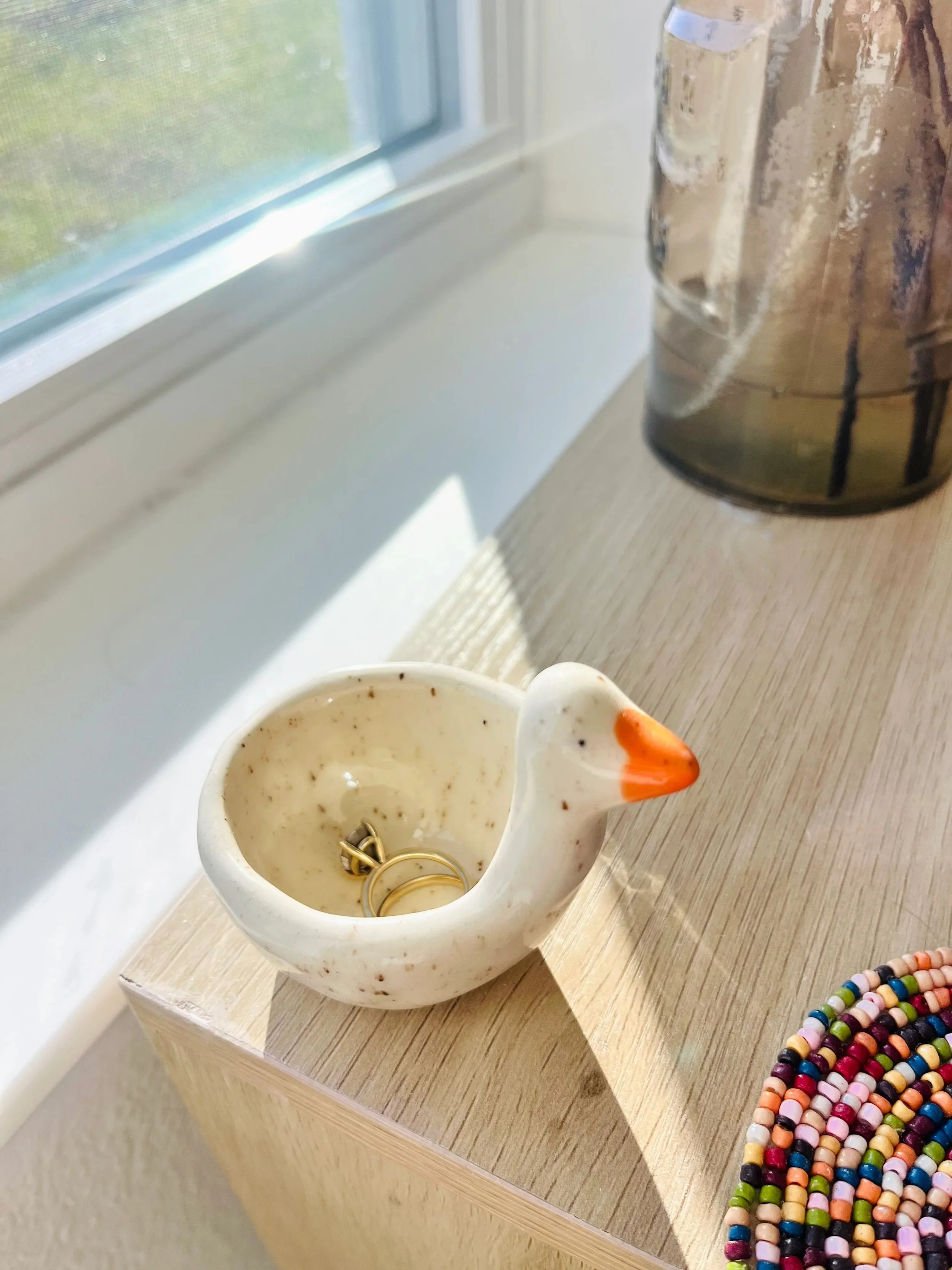 The story behind one of our best sellers: the silly goose ring holder 🪿💍

Meet Kat, the artist behind @vibrant.vessel, whose work we&rsquo;re so honored to share in the shop! From her studio on Florida&rsquo;s Space Coast, she crafts every piece to