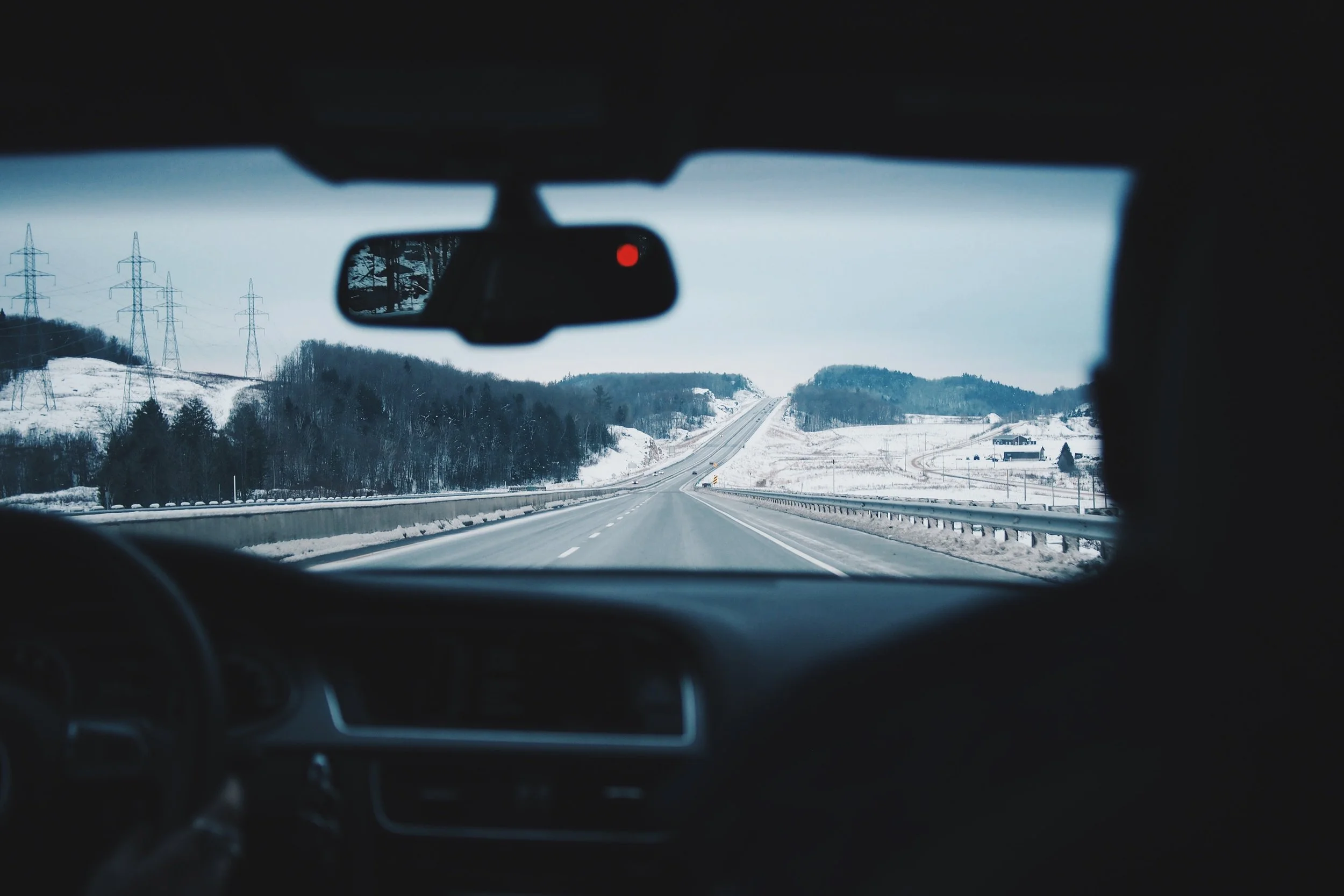 Driving through a snow covered landscape
