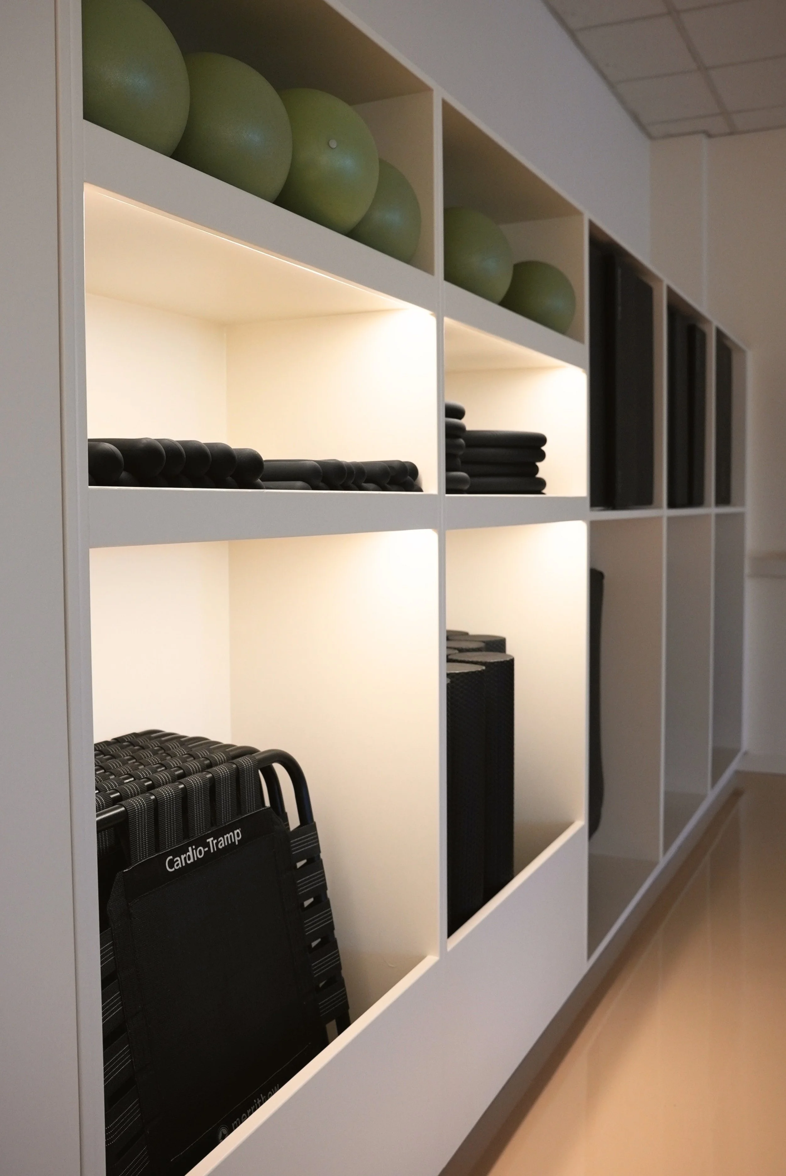 Illuminated custom storage installed by Voselec at Studio Down South