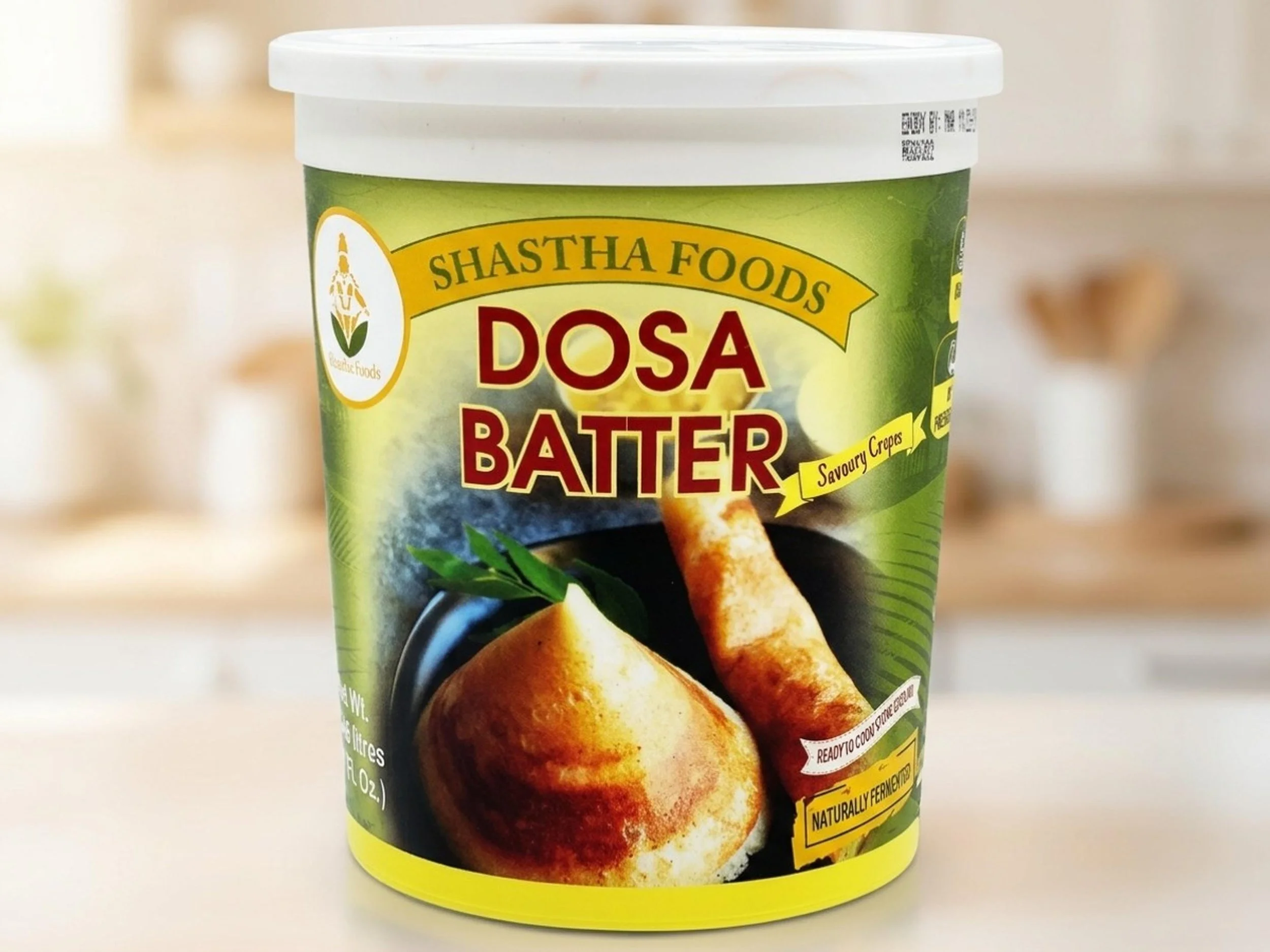 Shastha Foods dosa batter container with photos of prepared savory crepes