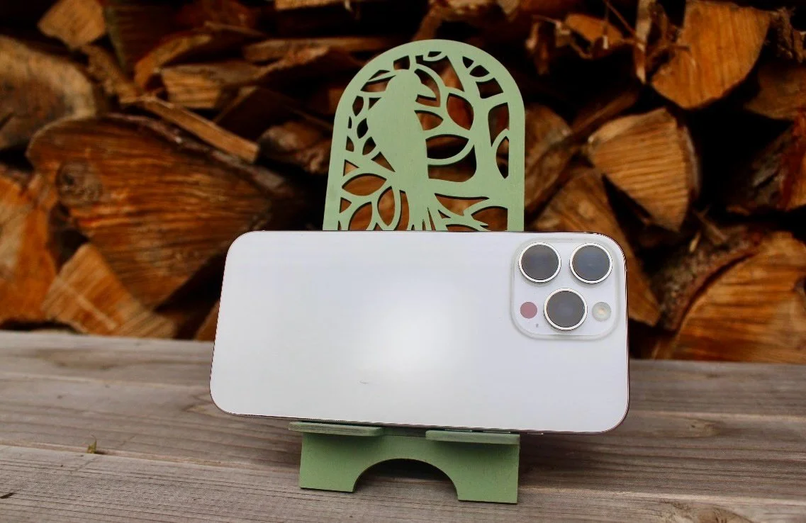 Laser-cut phone stand — raven design