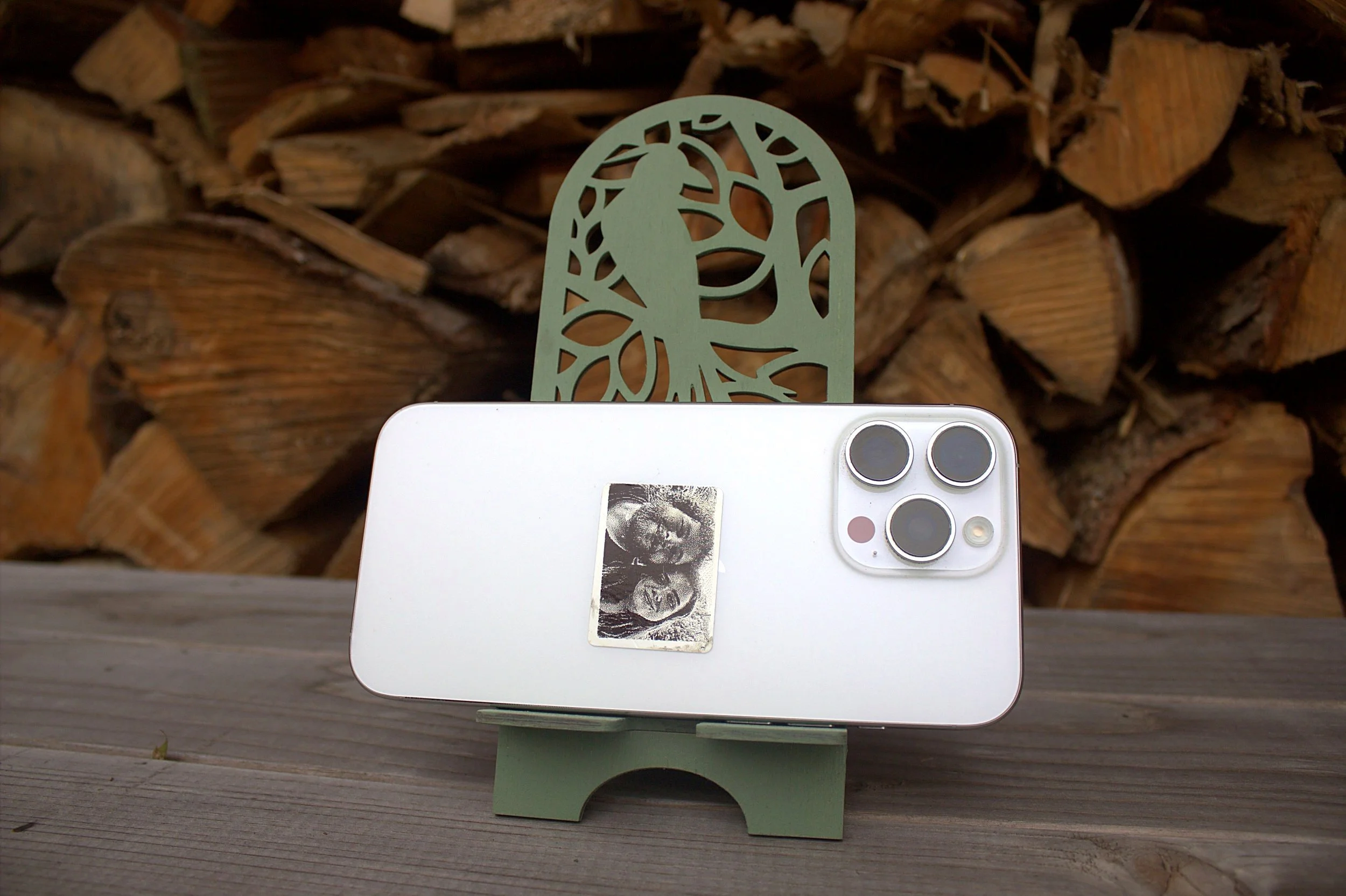 Laser-cut phone stand — shown holding a phone
