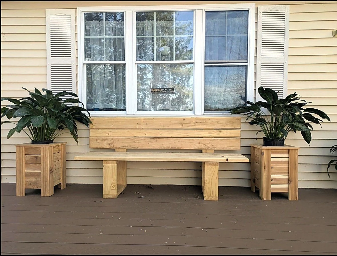 Rustic garden bench with matching planters