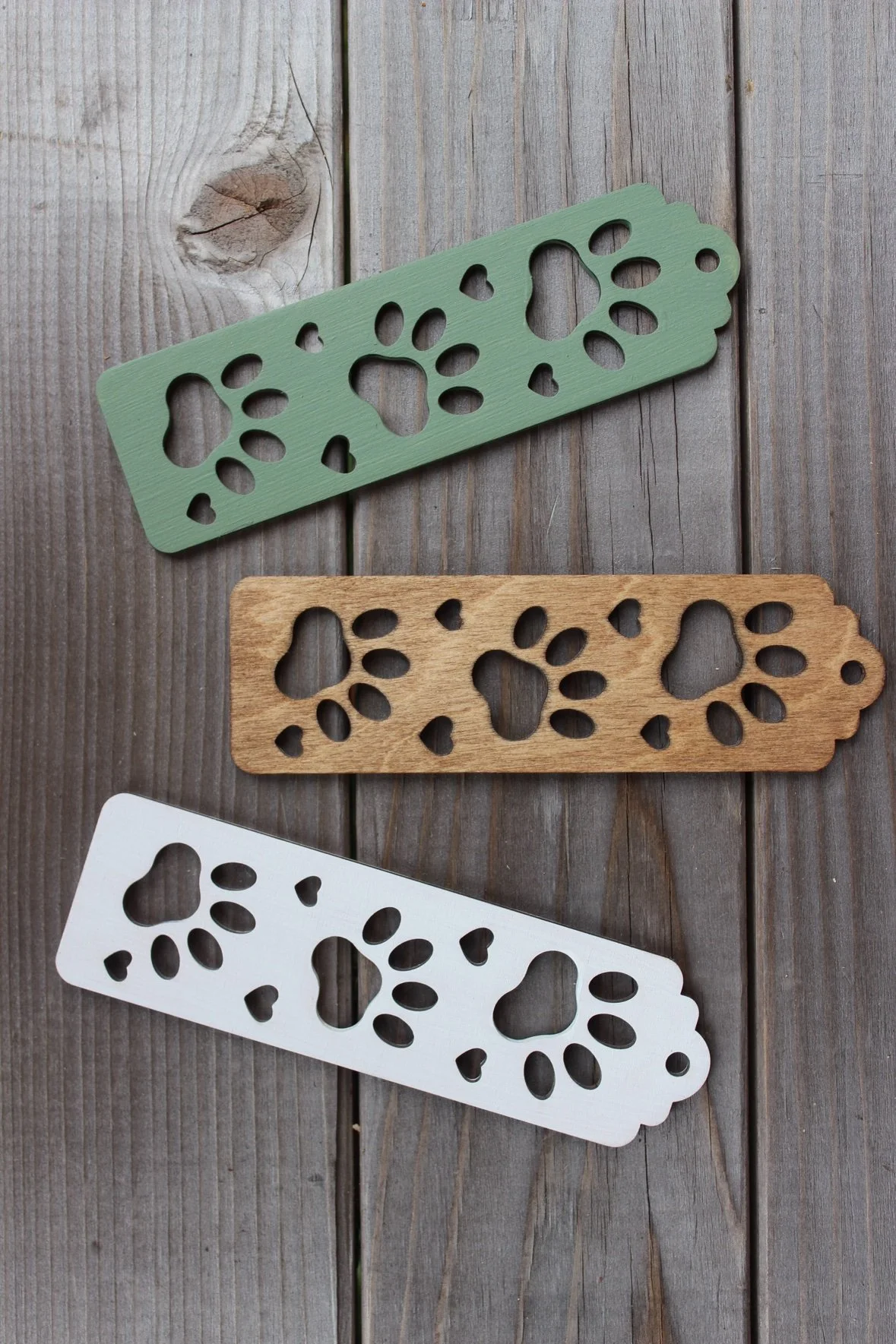 Laser-cut paw print bookmarks