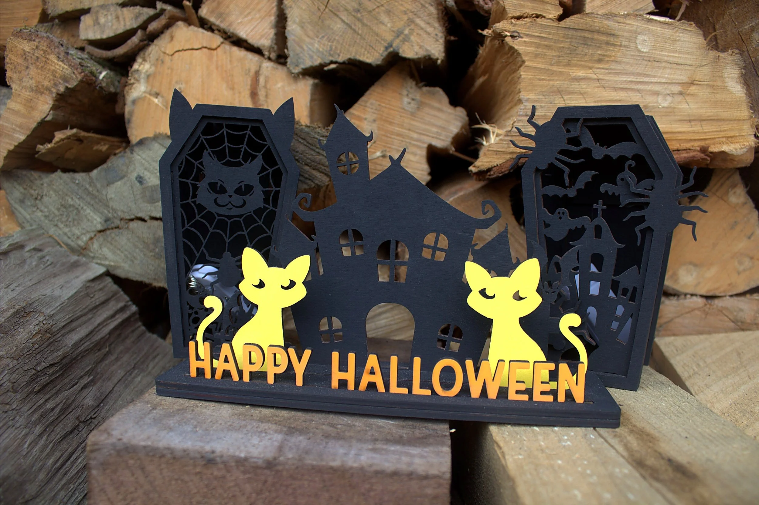 Laser-cut Happy Halloween lantern — haunted house scene