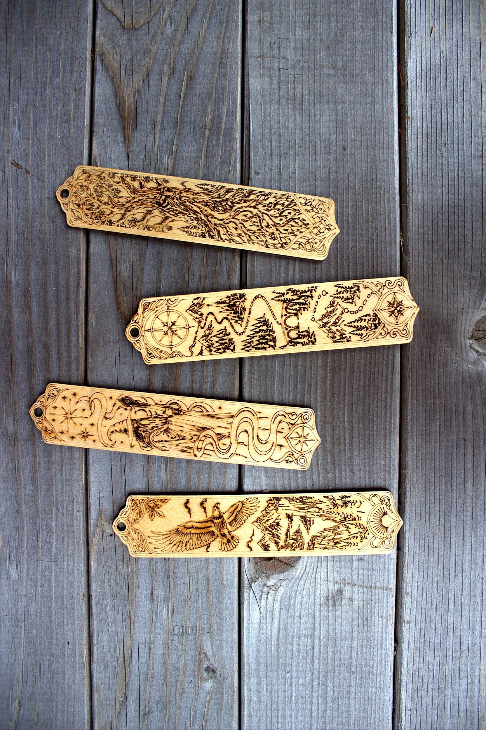 Laser-engraved wooden bookmarks — set of four scenic designs